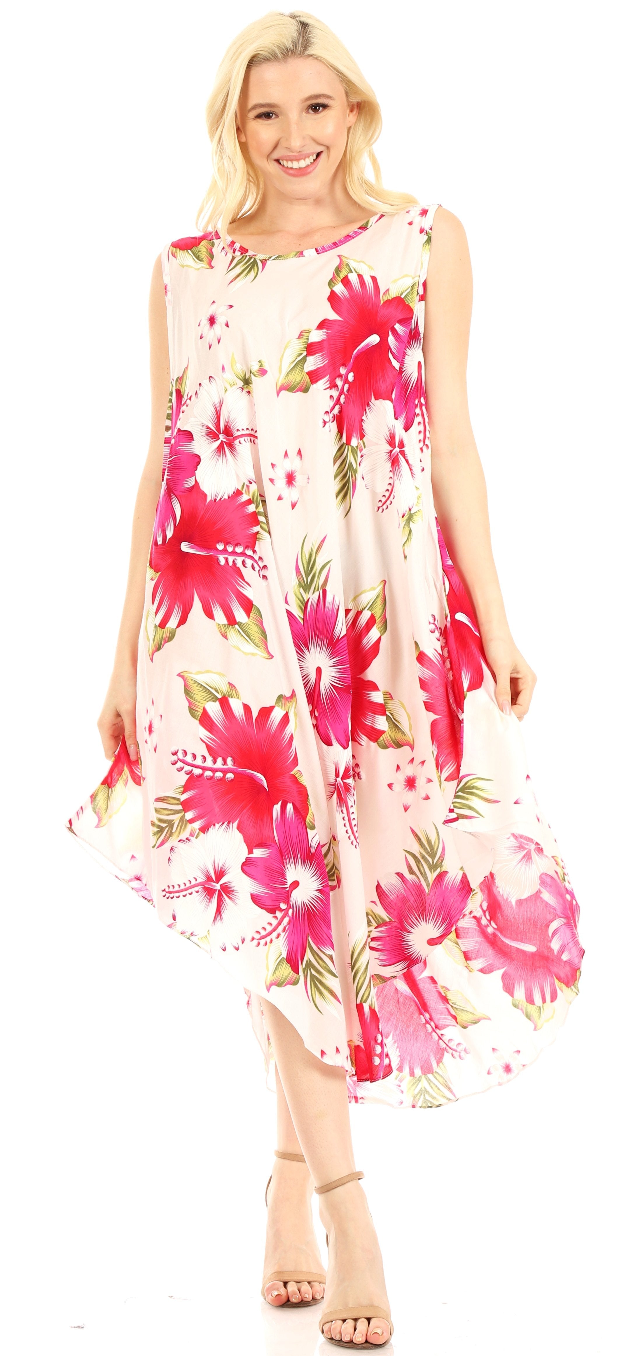 Woman wearing a sleeveless floral dress with pink and green flowers on a white background