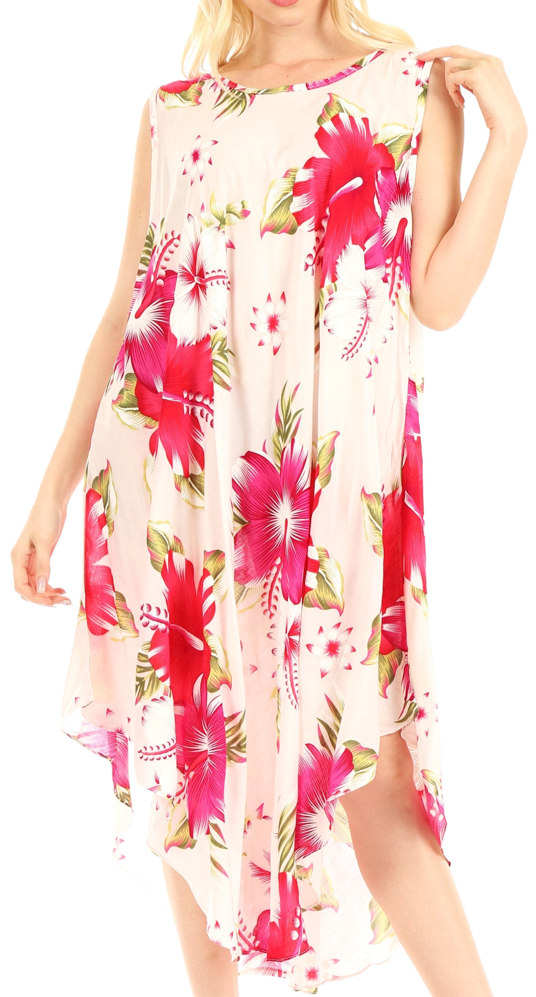 Woman wearing a floral dress with pink flowers on a white background