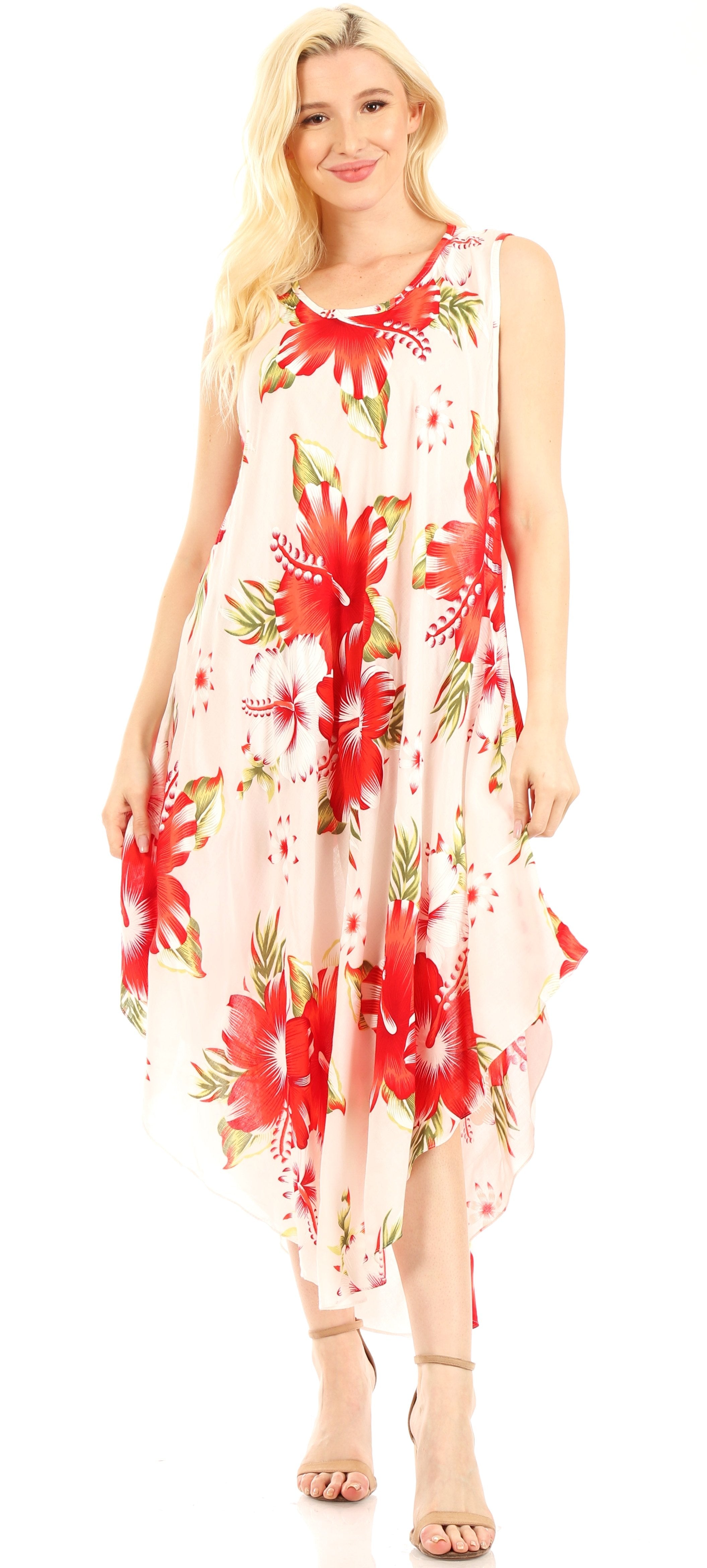 Woman wearing a floral dress with red and green patterns on a white background