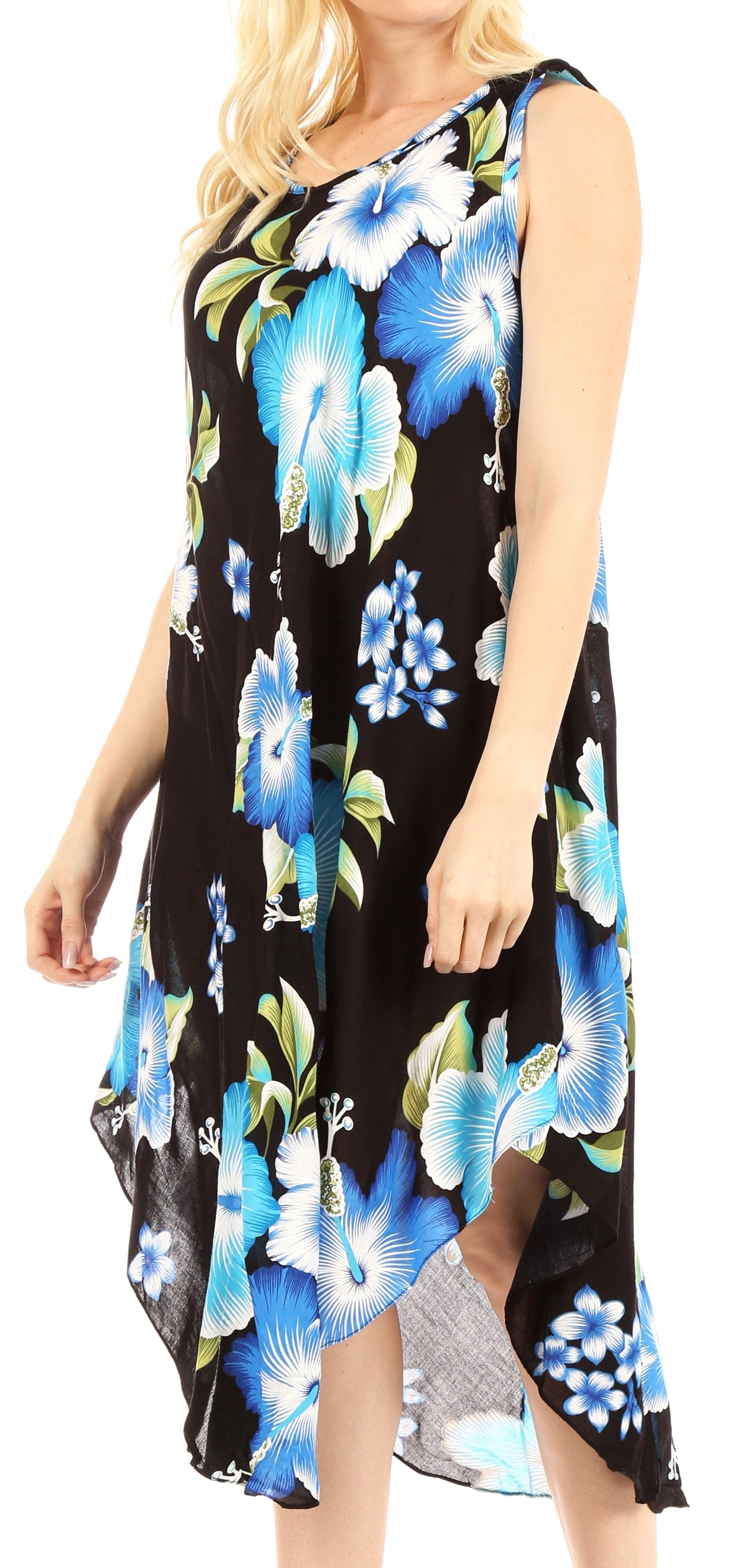 Woman wearing a black sleeveless dress with blue floral pattern