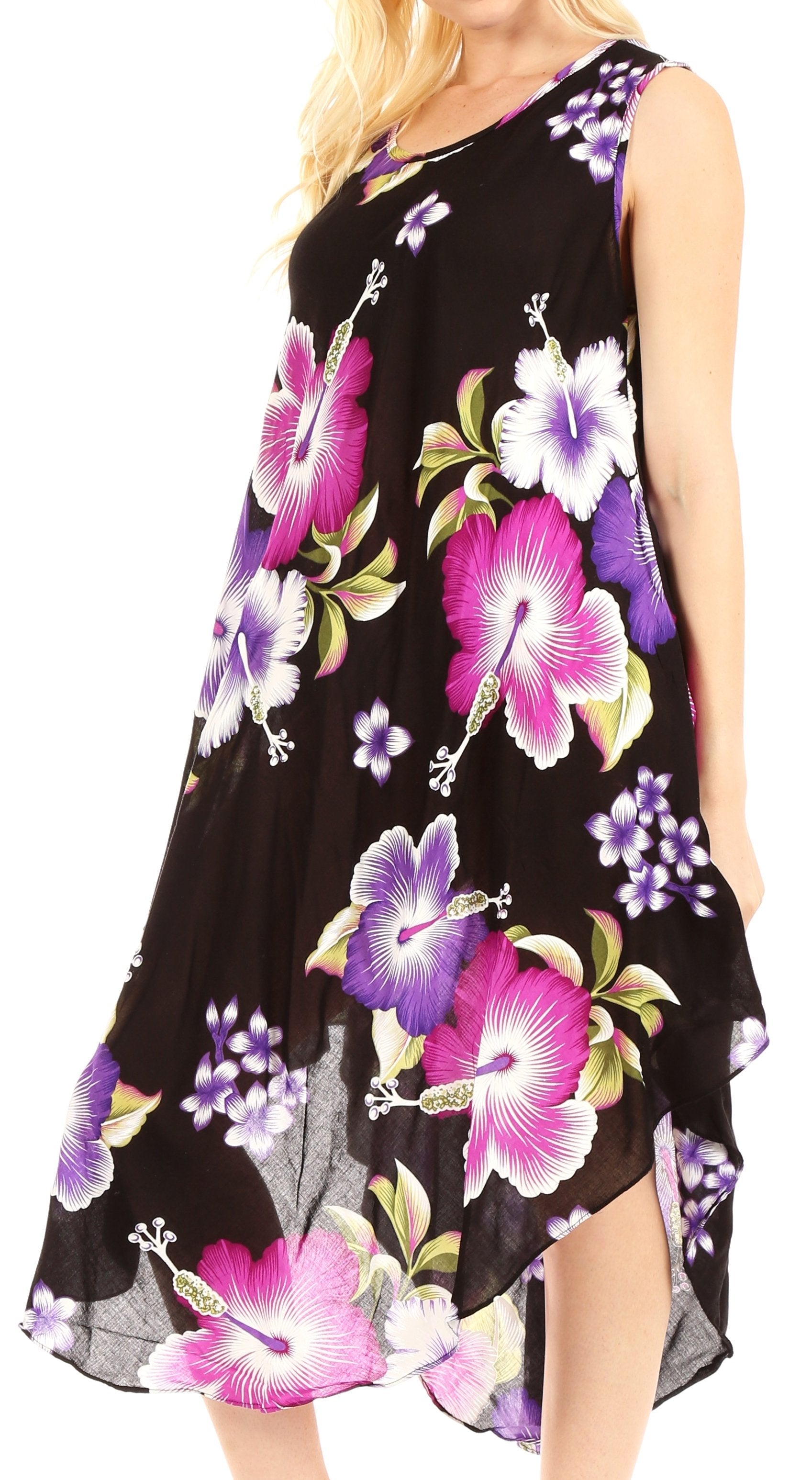 Black sleeveless dress with pink and purple floral pattern worn by a model.