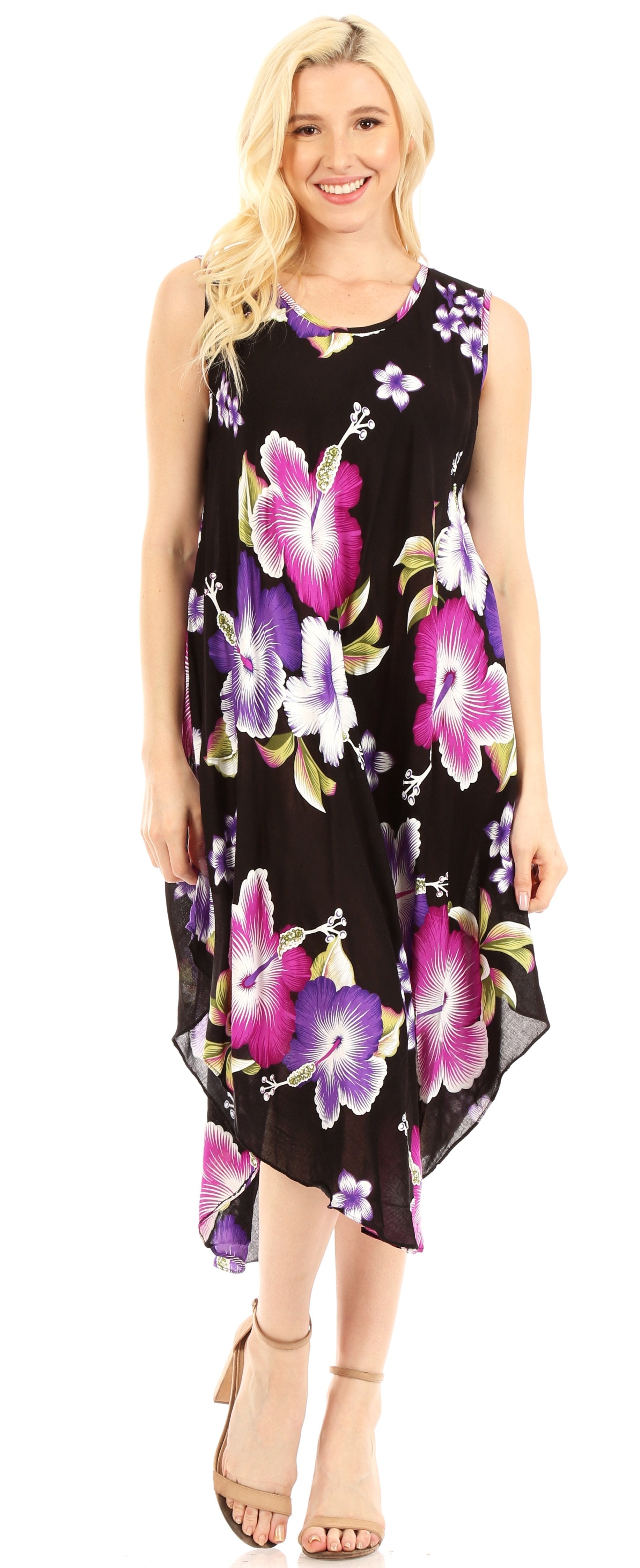 Woman wearing a sleeveless floral dress with a black background