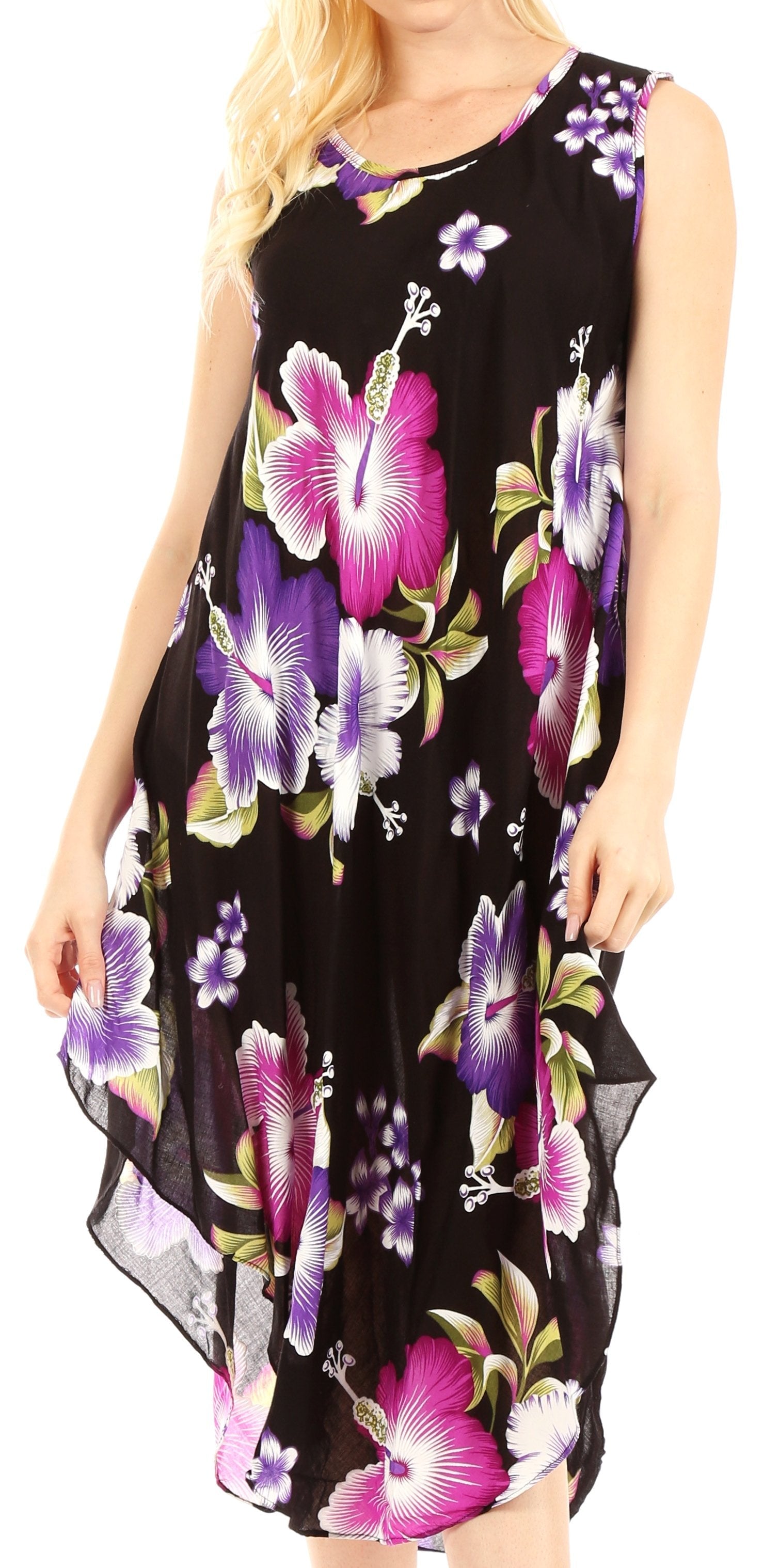 Black sleeveless dress with colorful floral pattern worn by a model