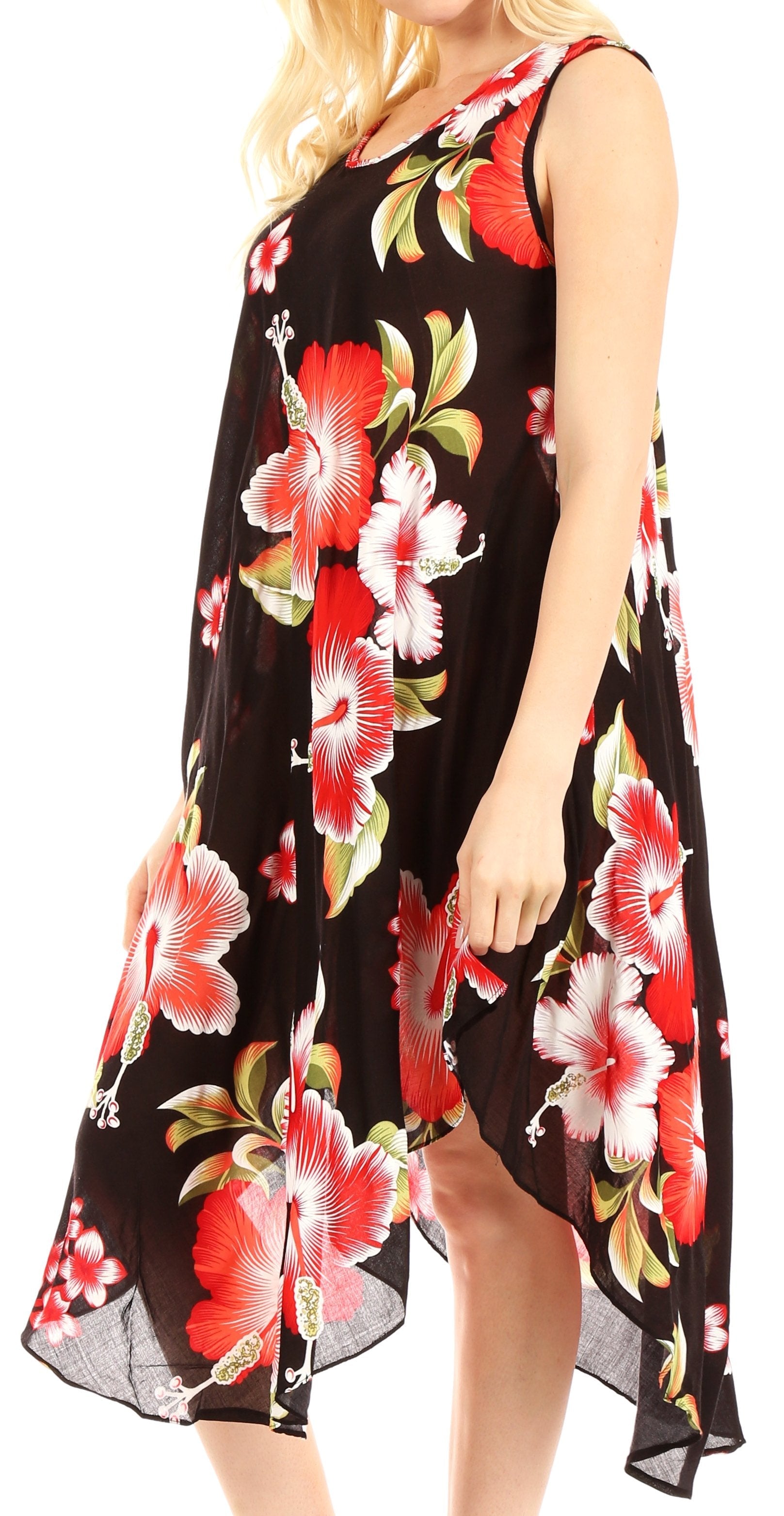 Woman wearing a black dress with red floral pattern on a white background