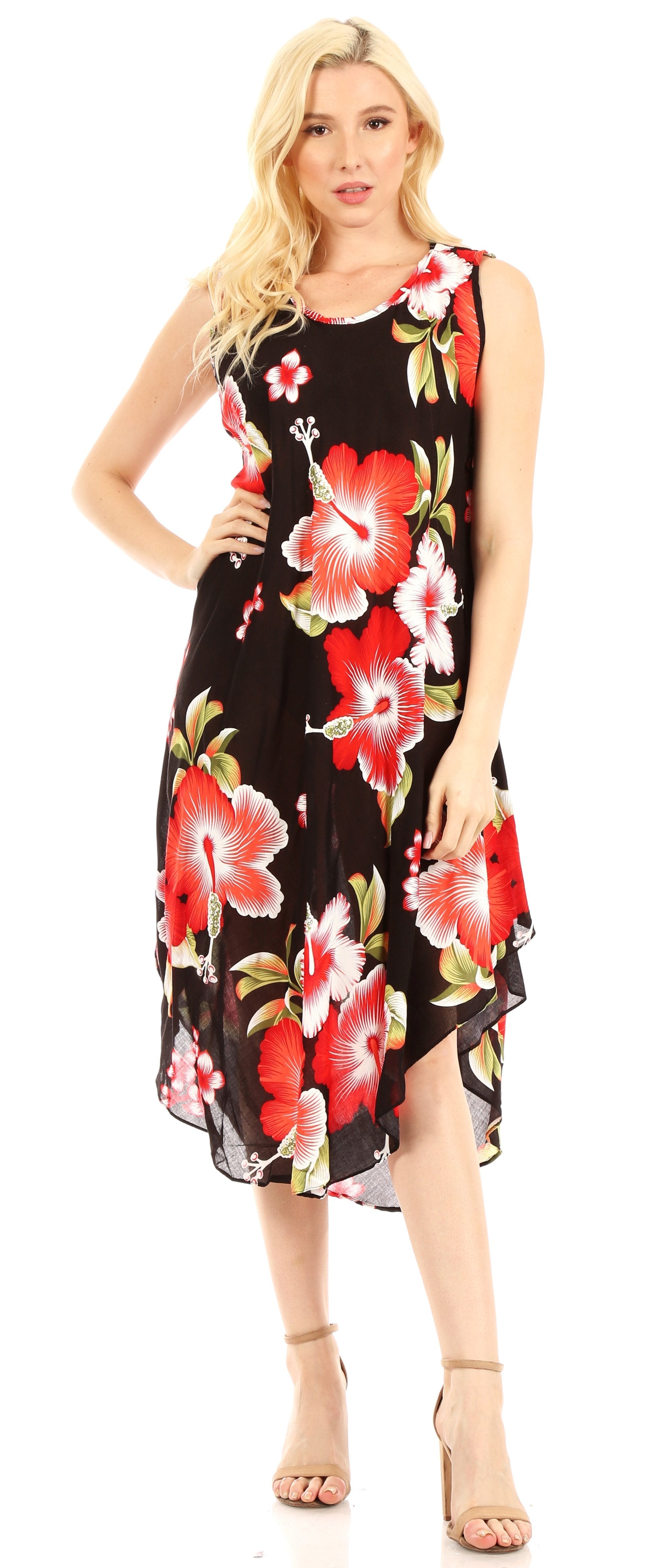Woman wearing a black floral dress with red and pink flowers on a white background