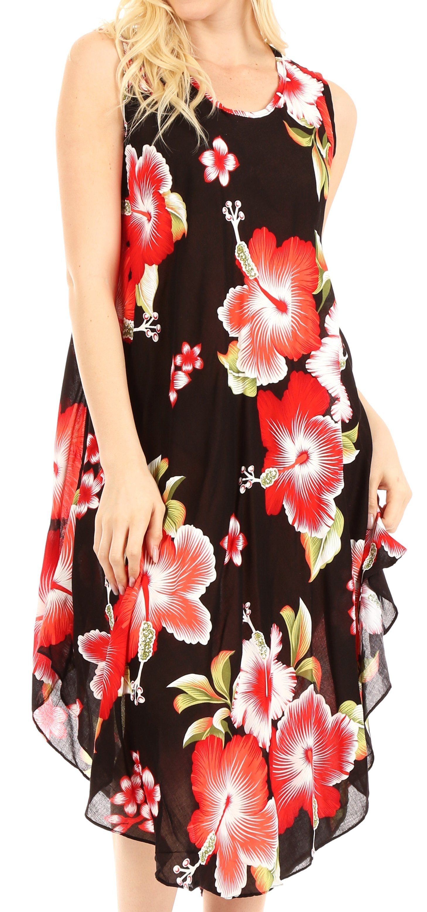 Woman wearing a black sleeveless dress with red floral pattern on a white background