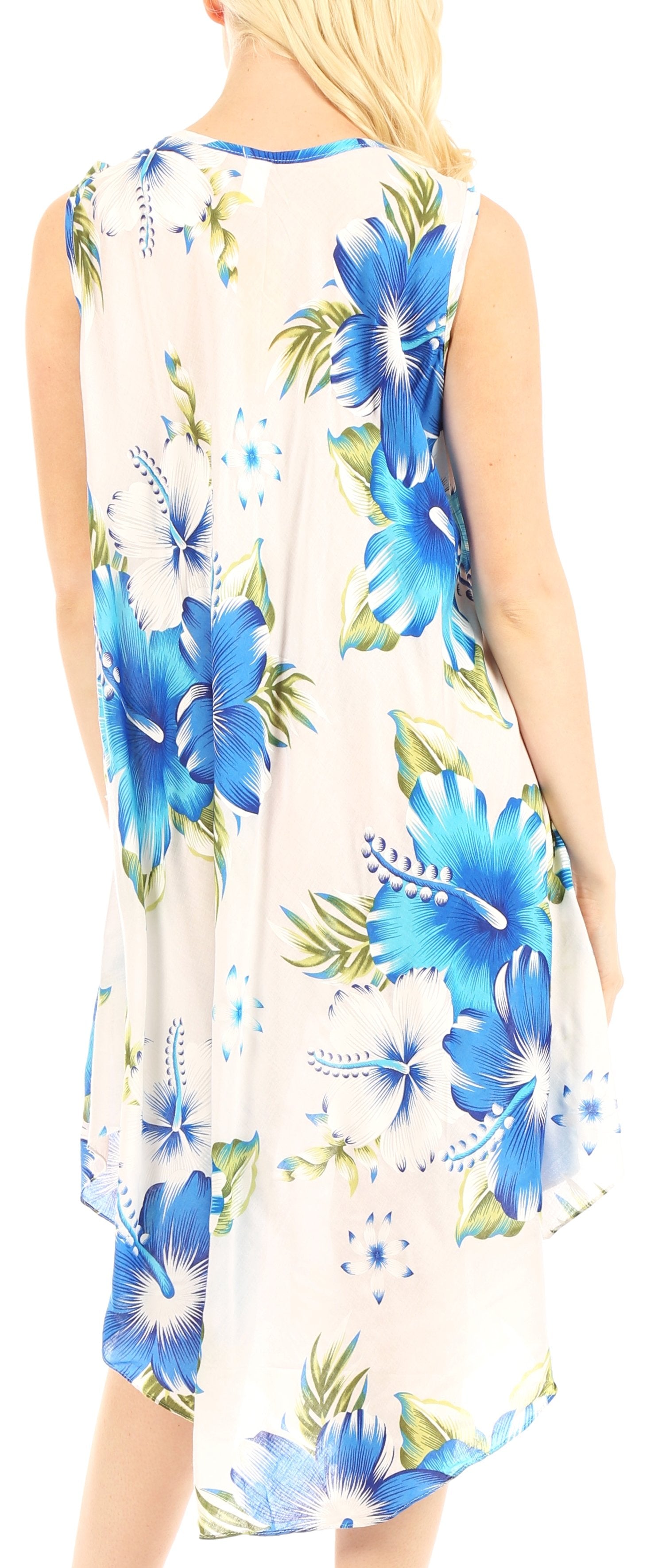 Woman wearing a sleeveless dress with blue floral pattern on a white background