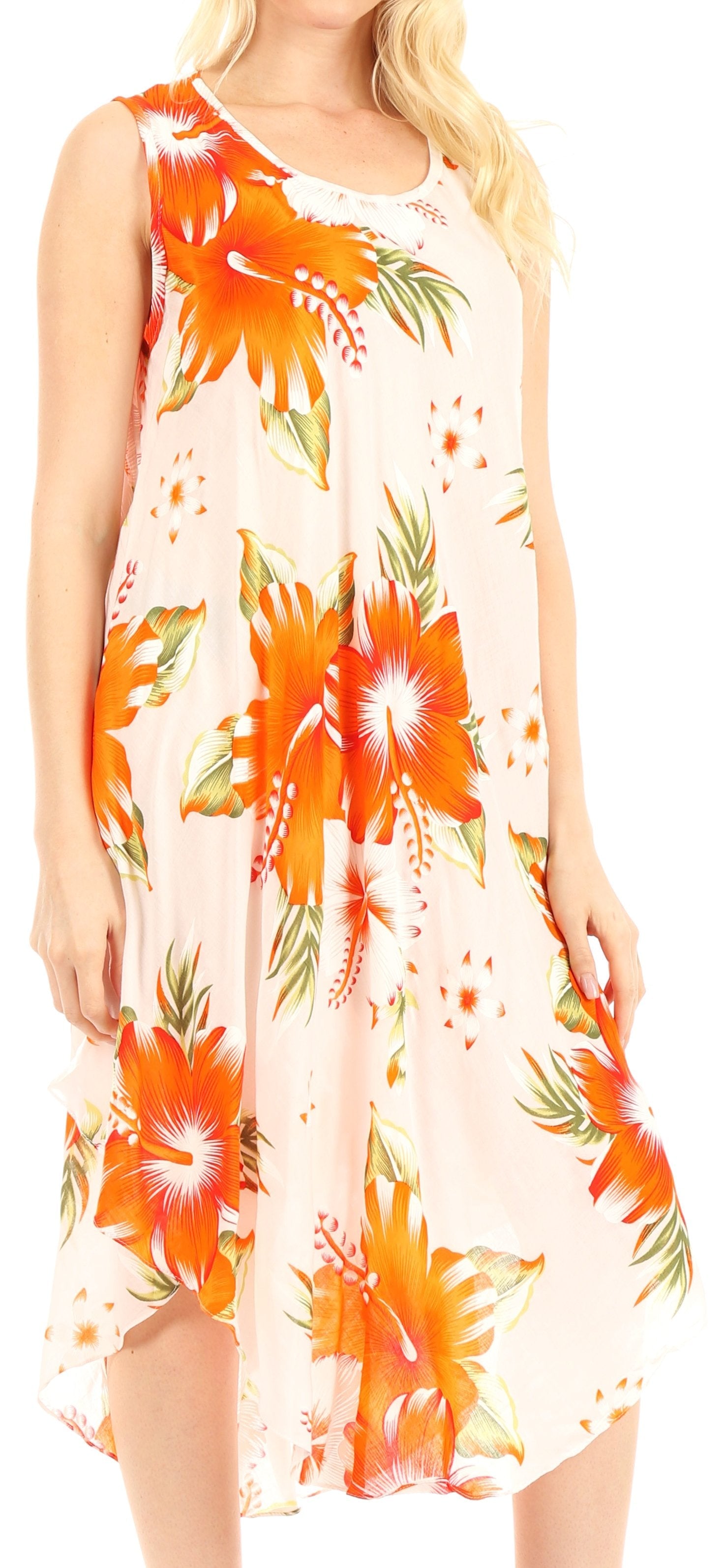 Woman wearing a sleeveless dress with orange floral pattern on a beige background
