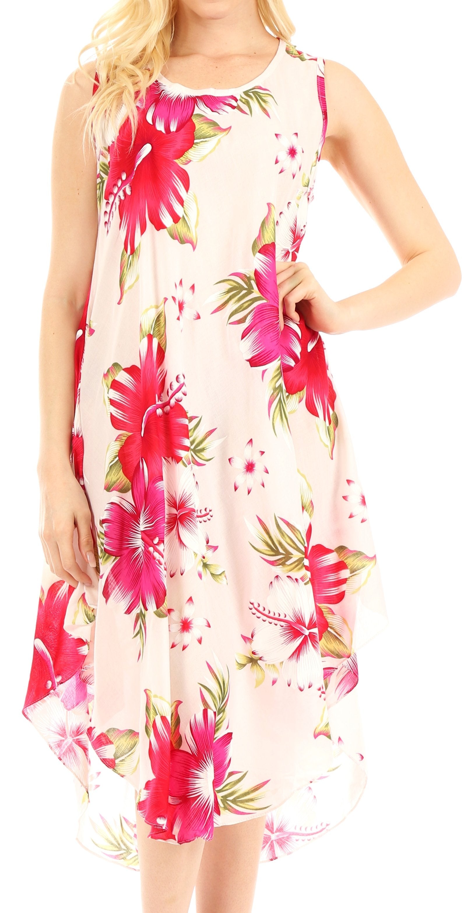 Woman wearing a floral dress with pink flowers on a white background