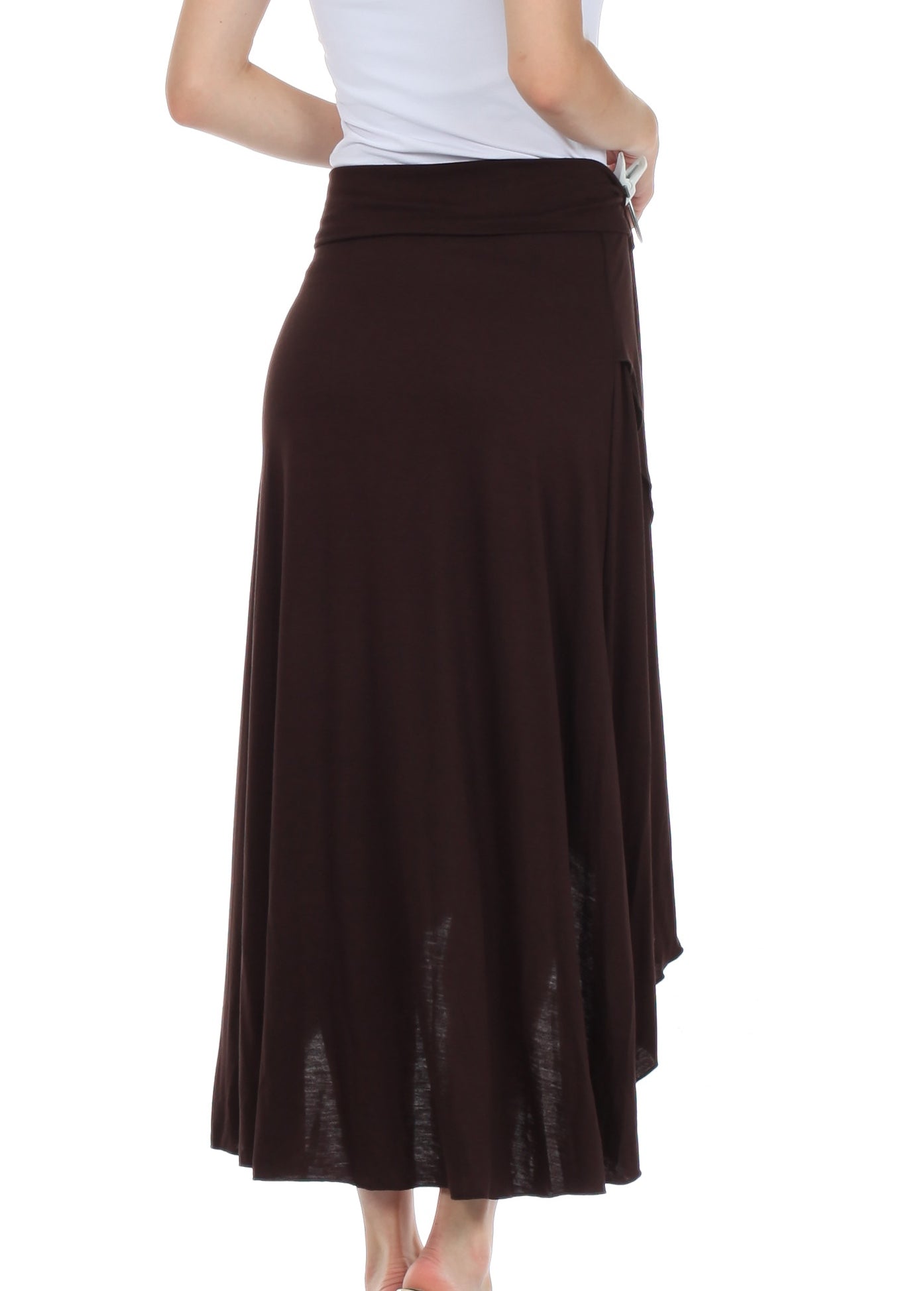 Brown long skirt worn by a person on a white background