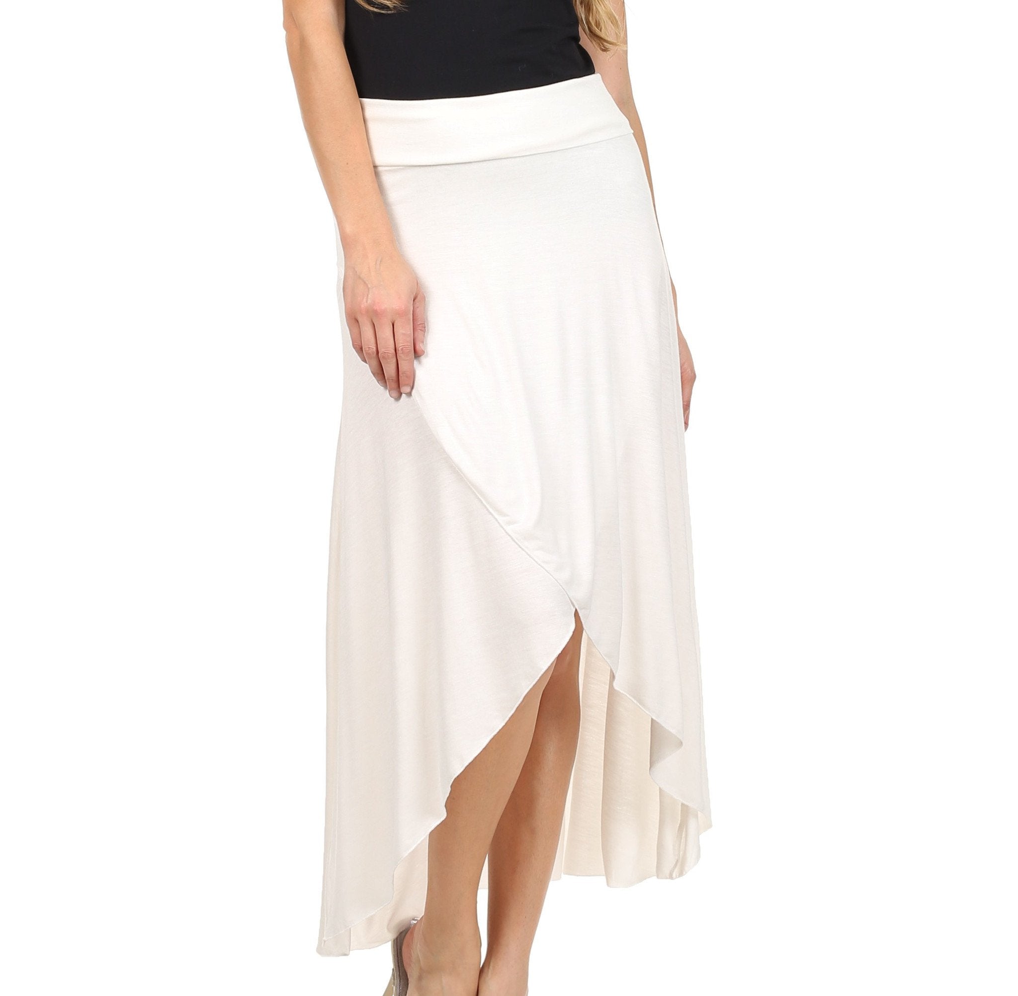 White skirt worn by a person on a white background