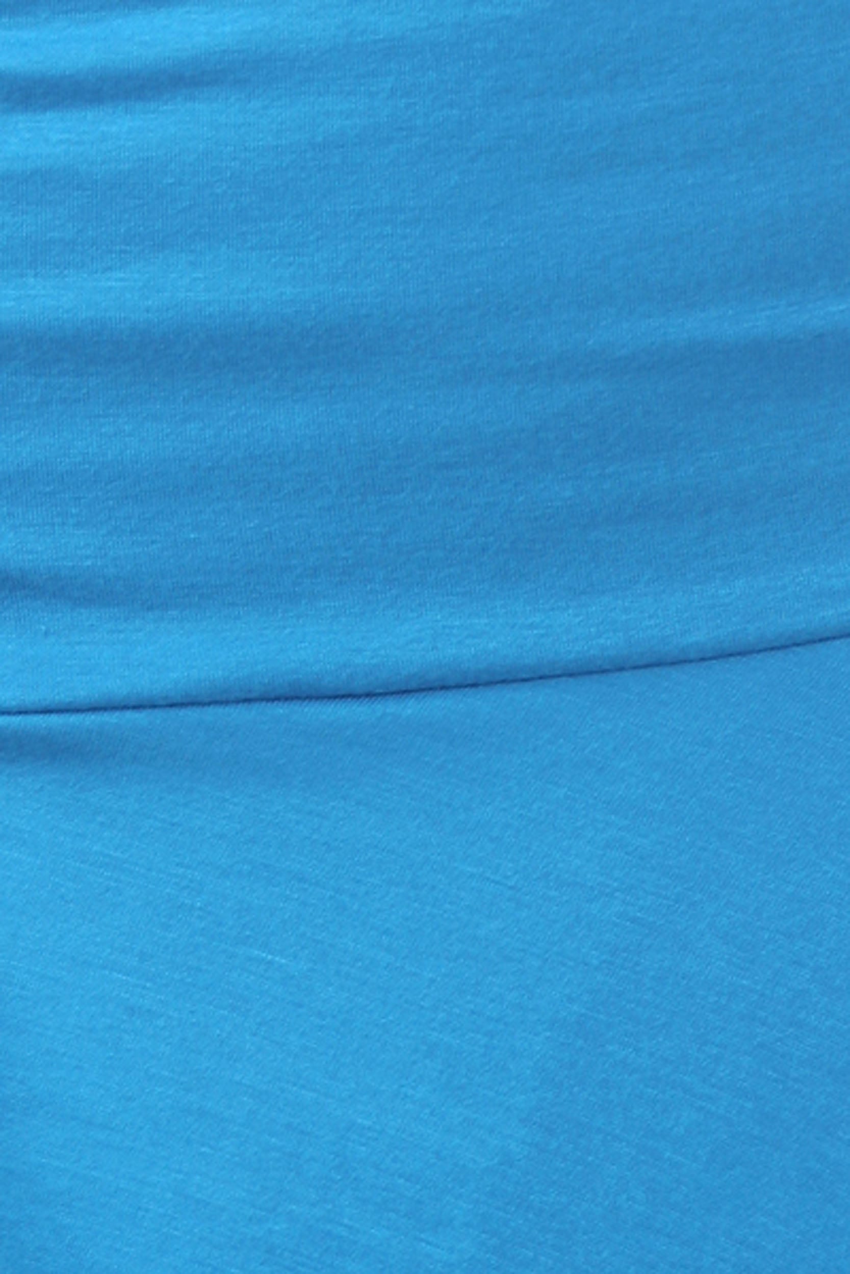 Close-up of blue fabric with a slight texture