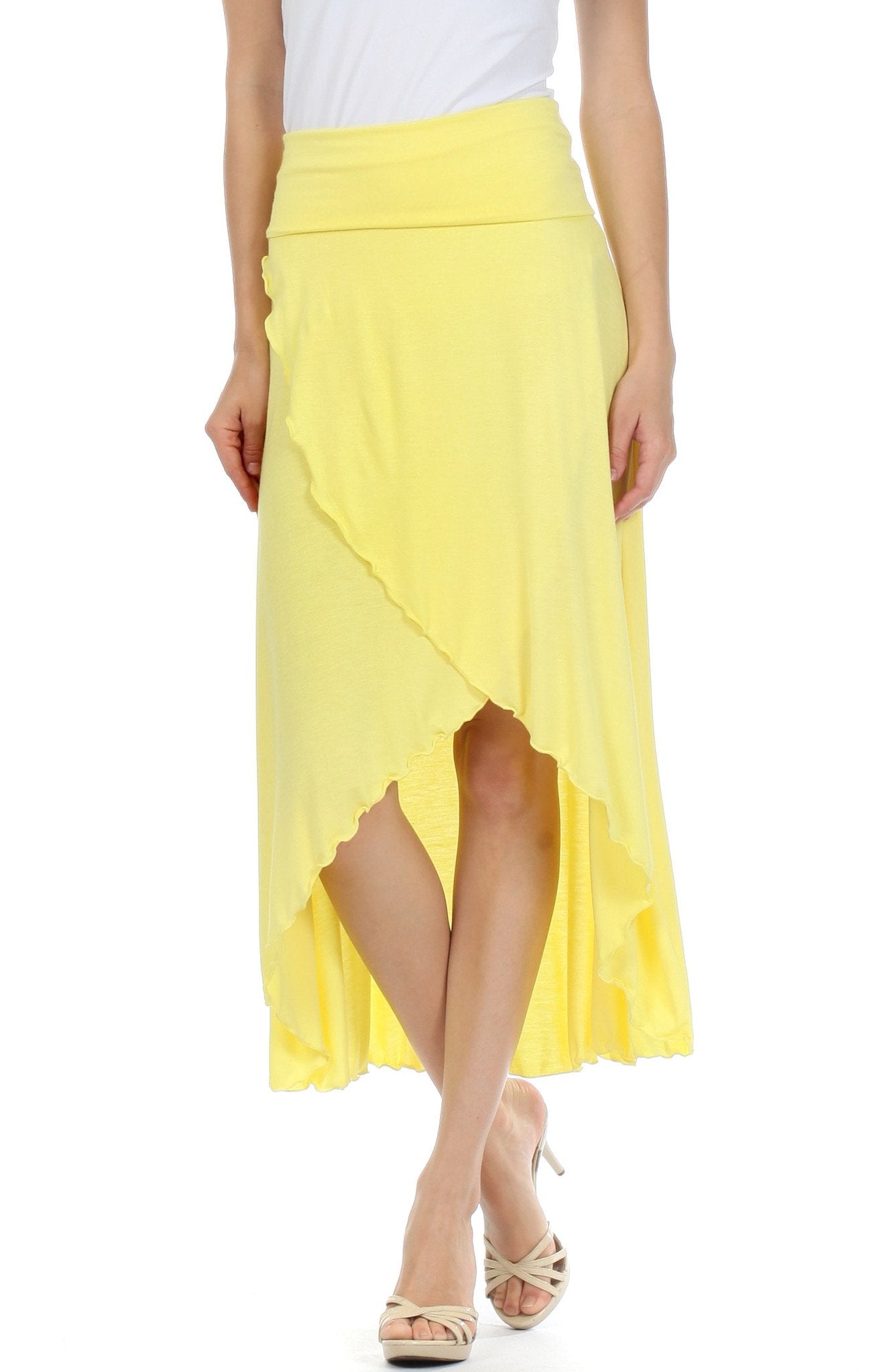Yellow skirt worn by a person on a white background