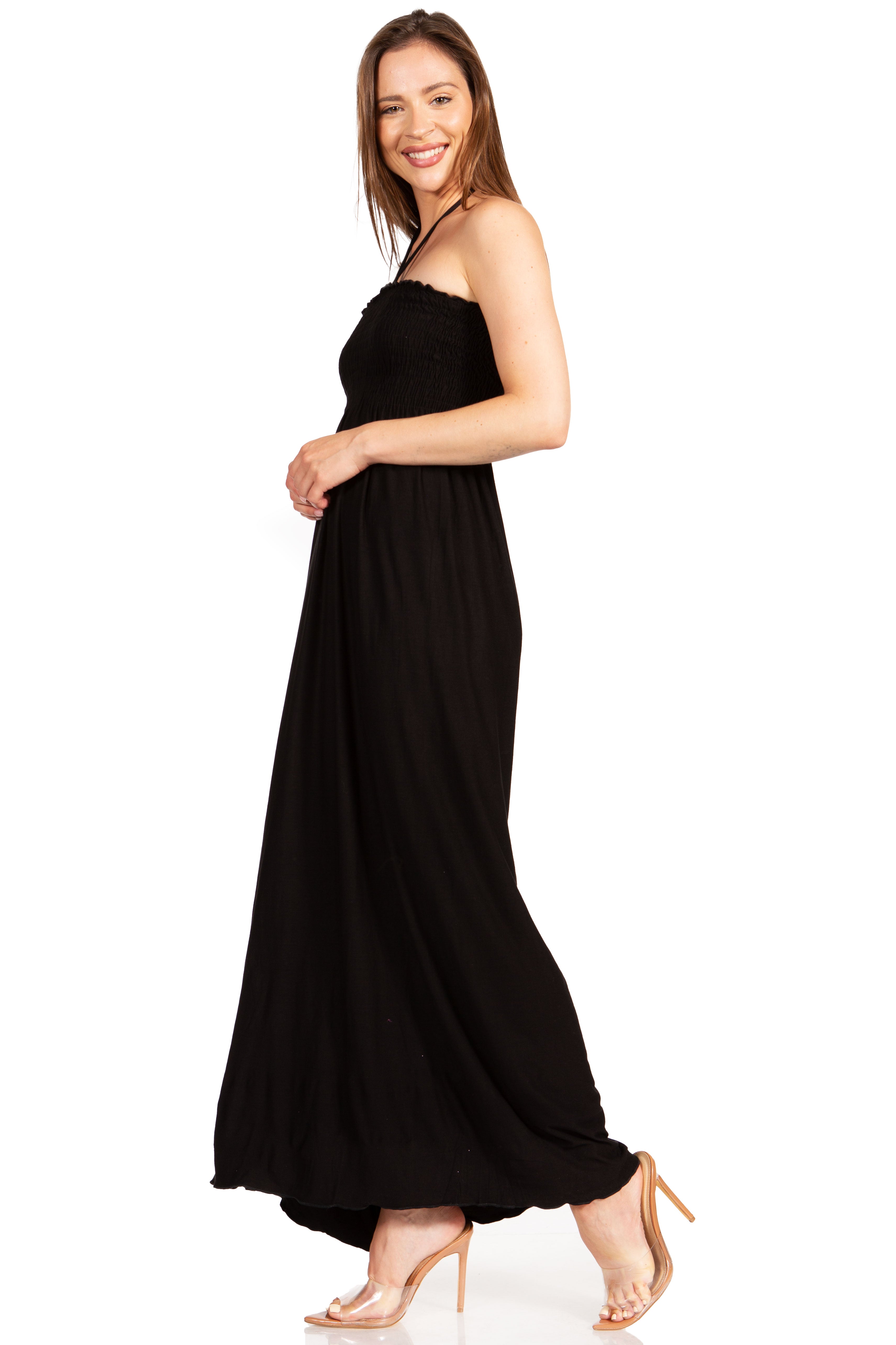 Woman wearing a black strapless gown on a white background