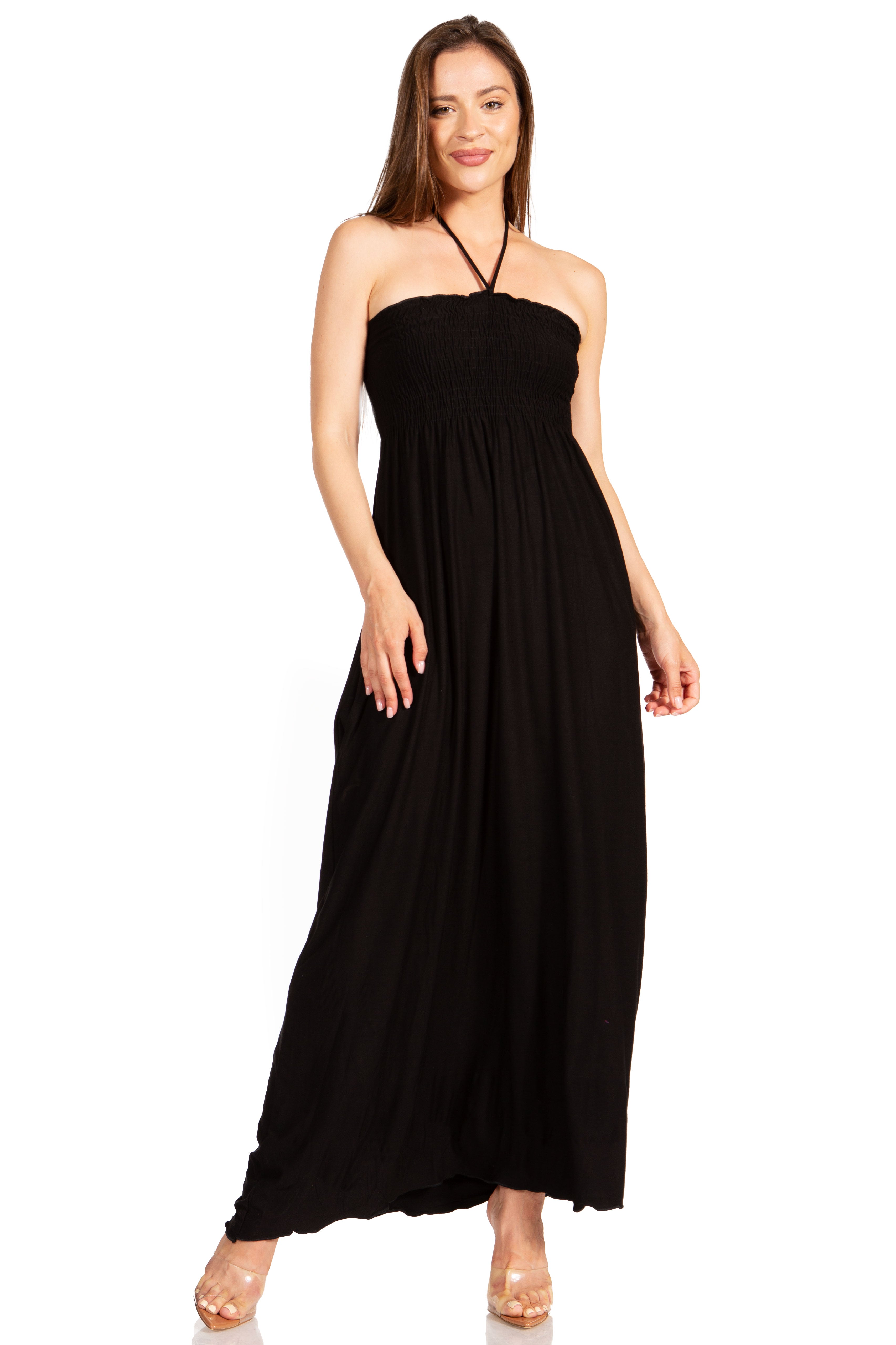 Woman wearing a black strapless maxi dress on a white background