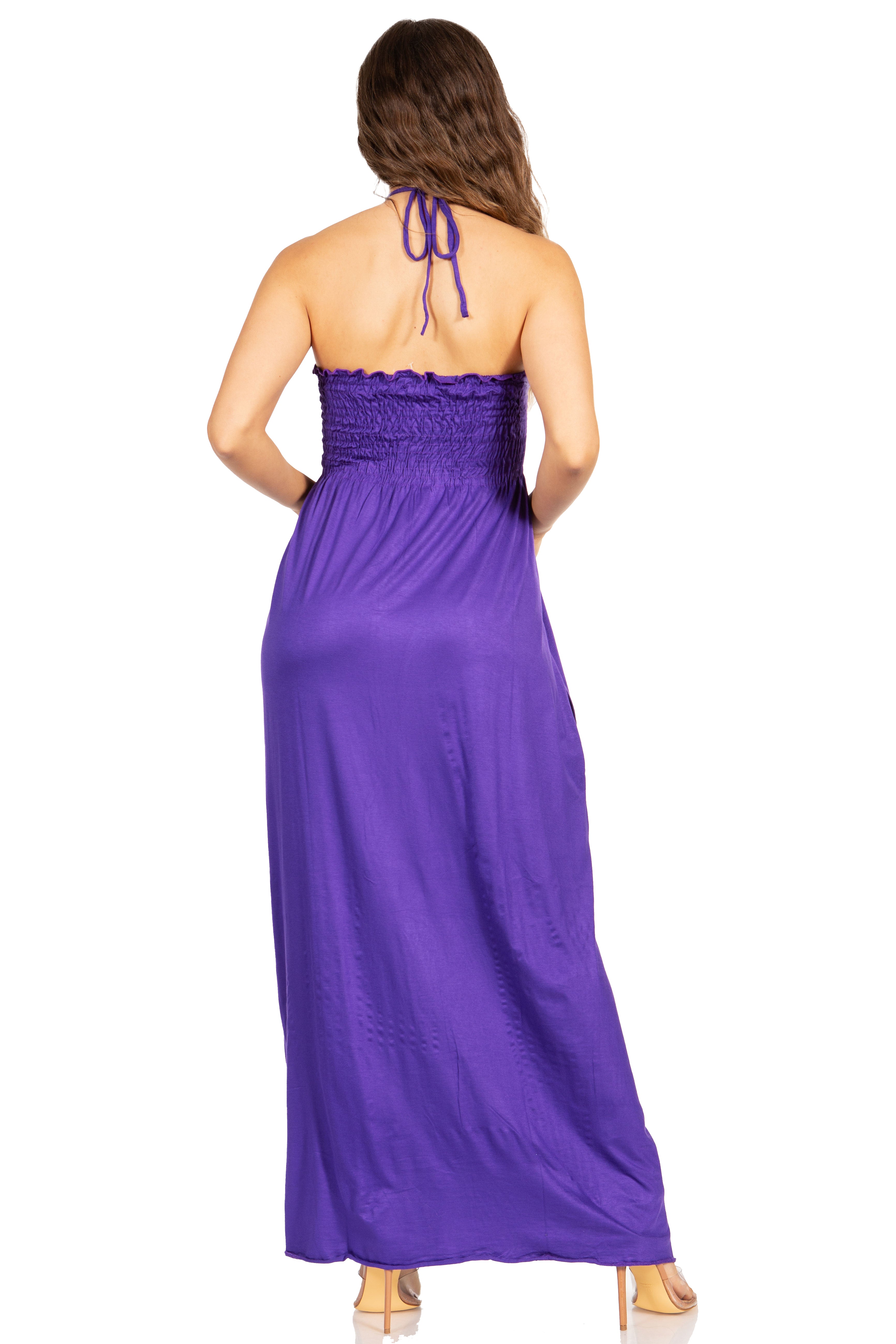 Purple halter neck dress worn by a model on a white background