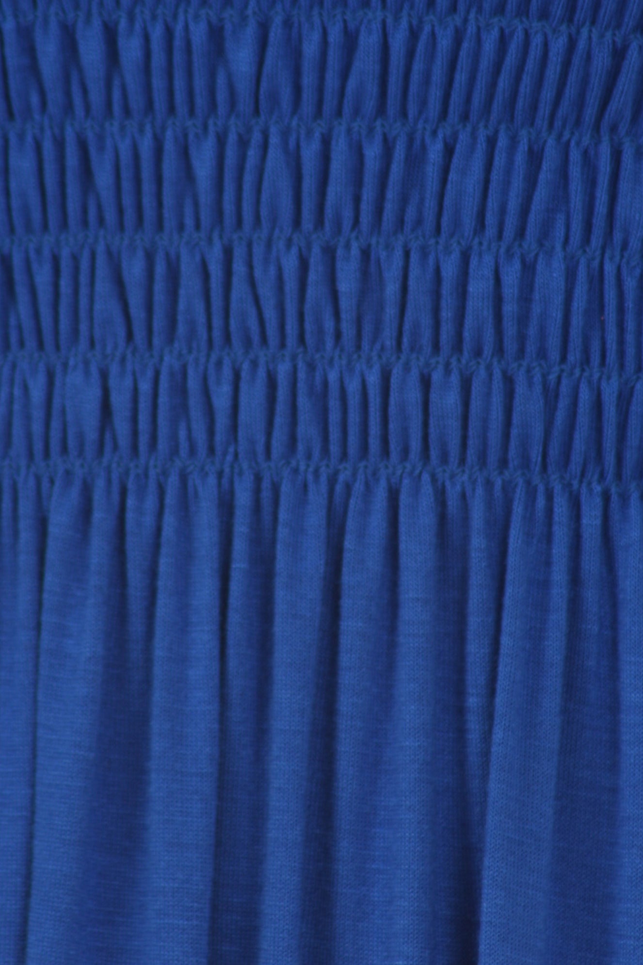 Close-up of blue fabric with a textured pattern