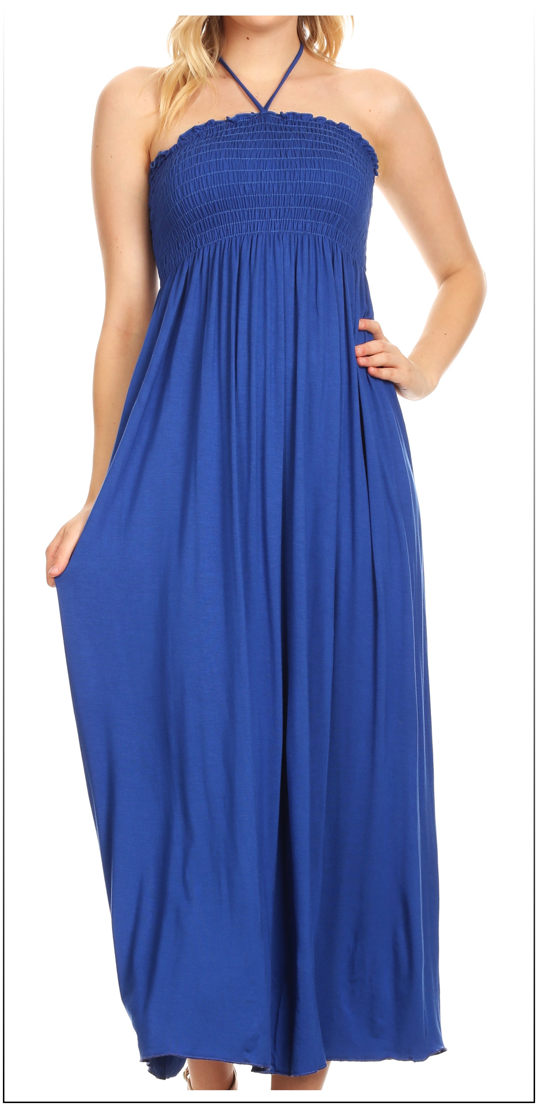 Blue halter neck dress worn by a model on a white background