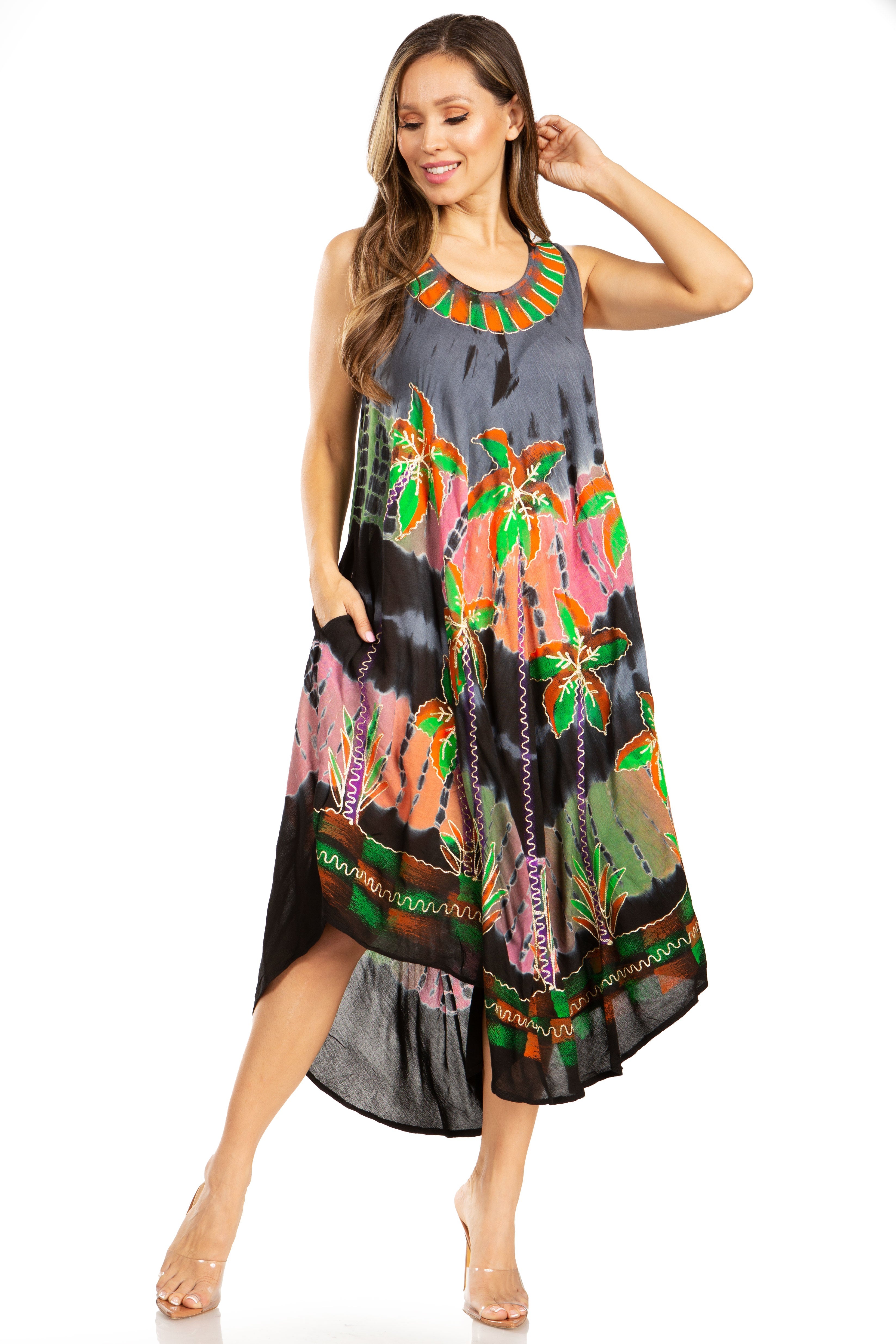 Woman wearing a colorful floral dress on a white background