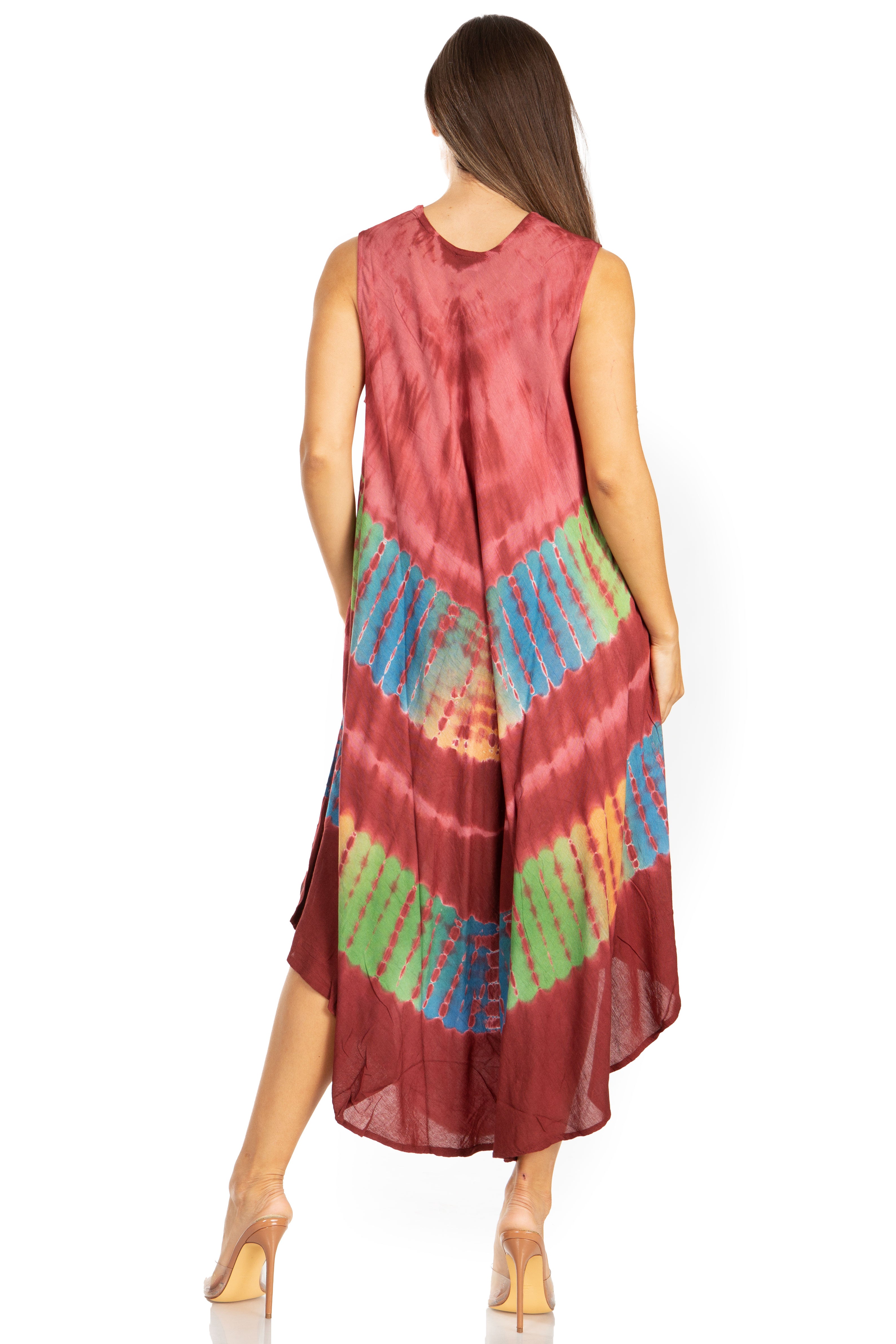 Woman wearing a tie-dye dress with a white background
