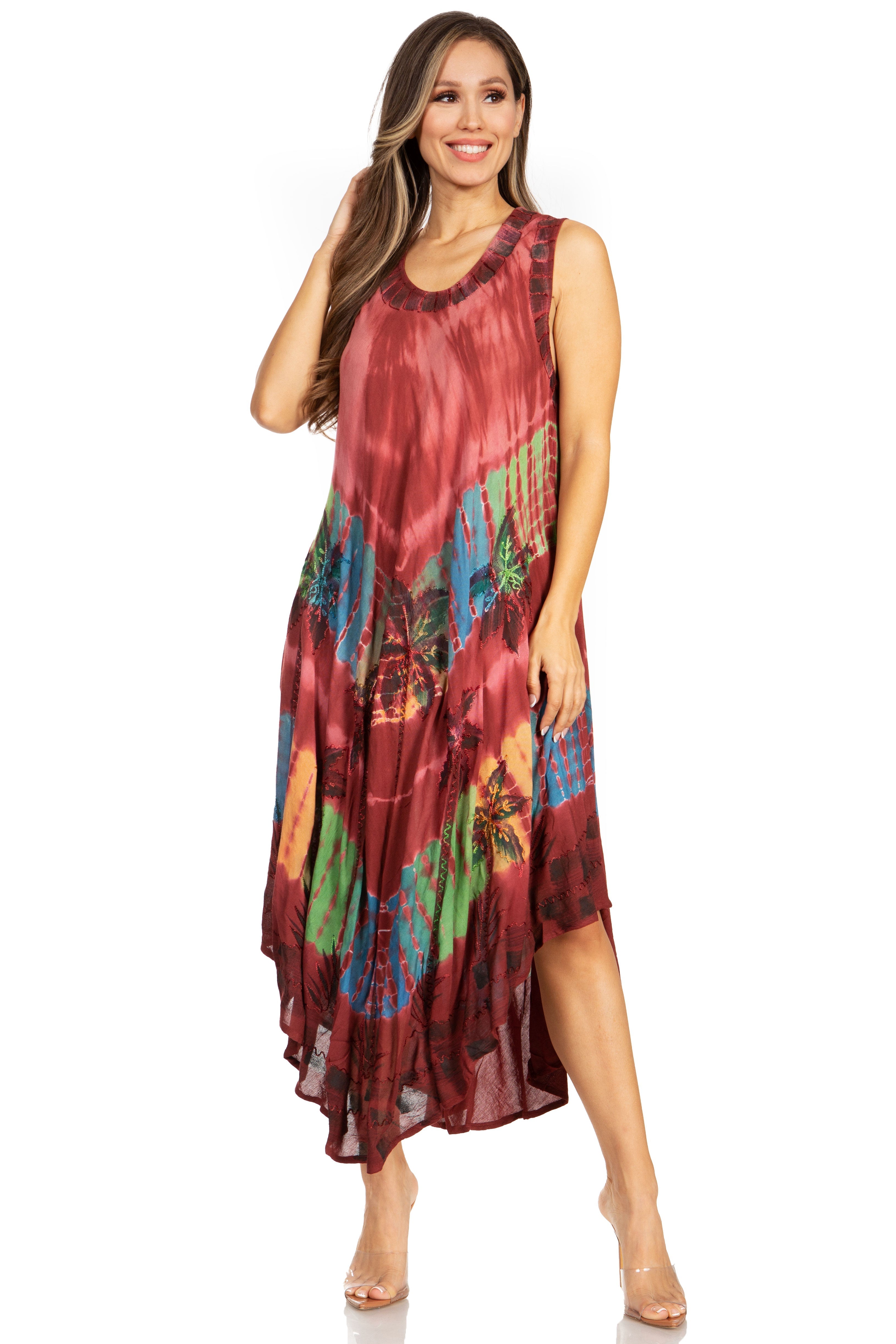 Woman wearing a colorful sleeveless dress on a white background