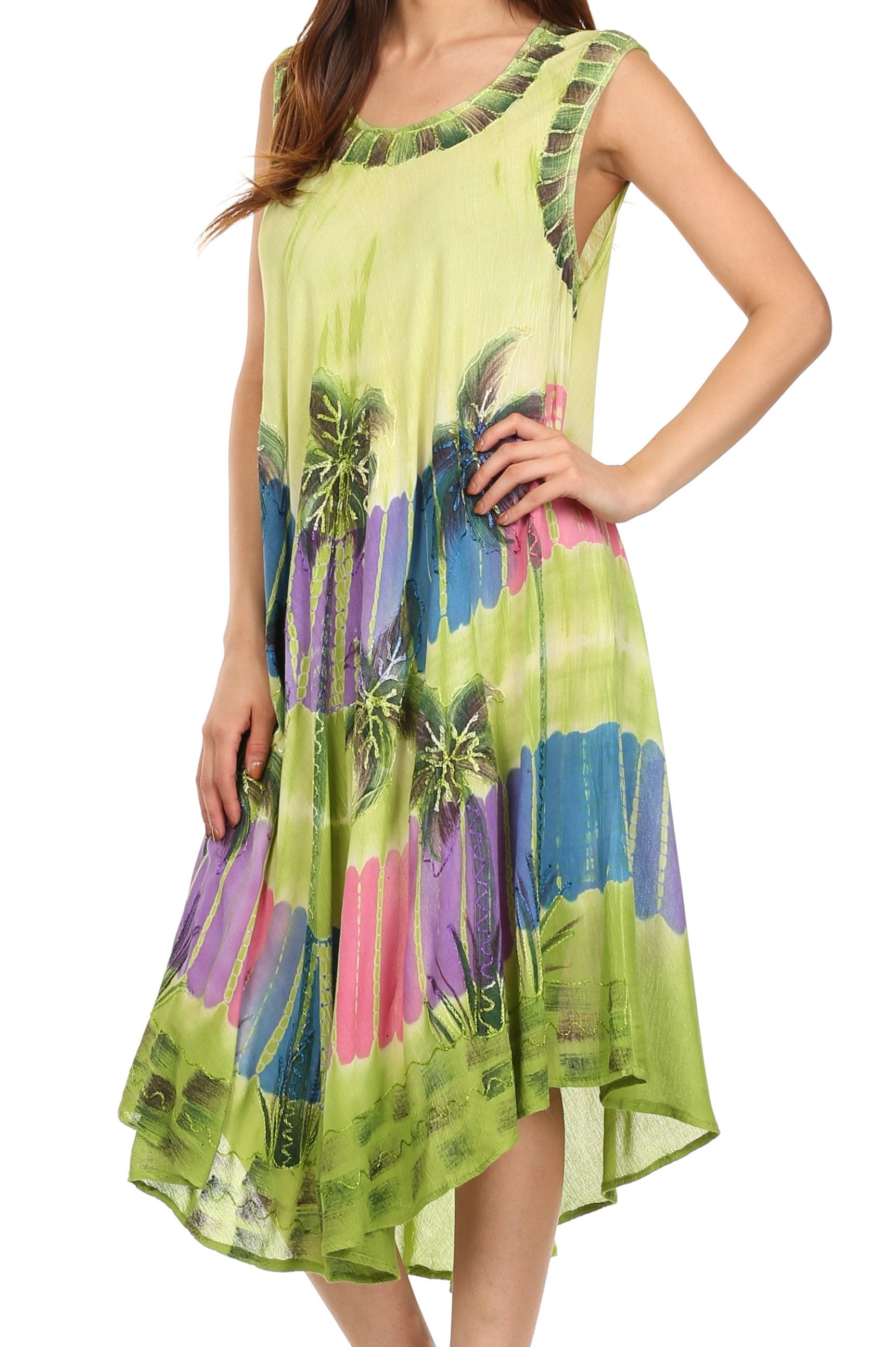 Woman wearing a colorful dress with floral patterns on a white background