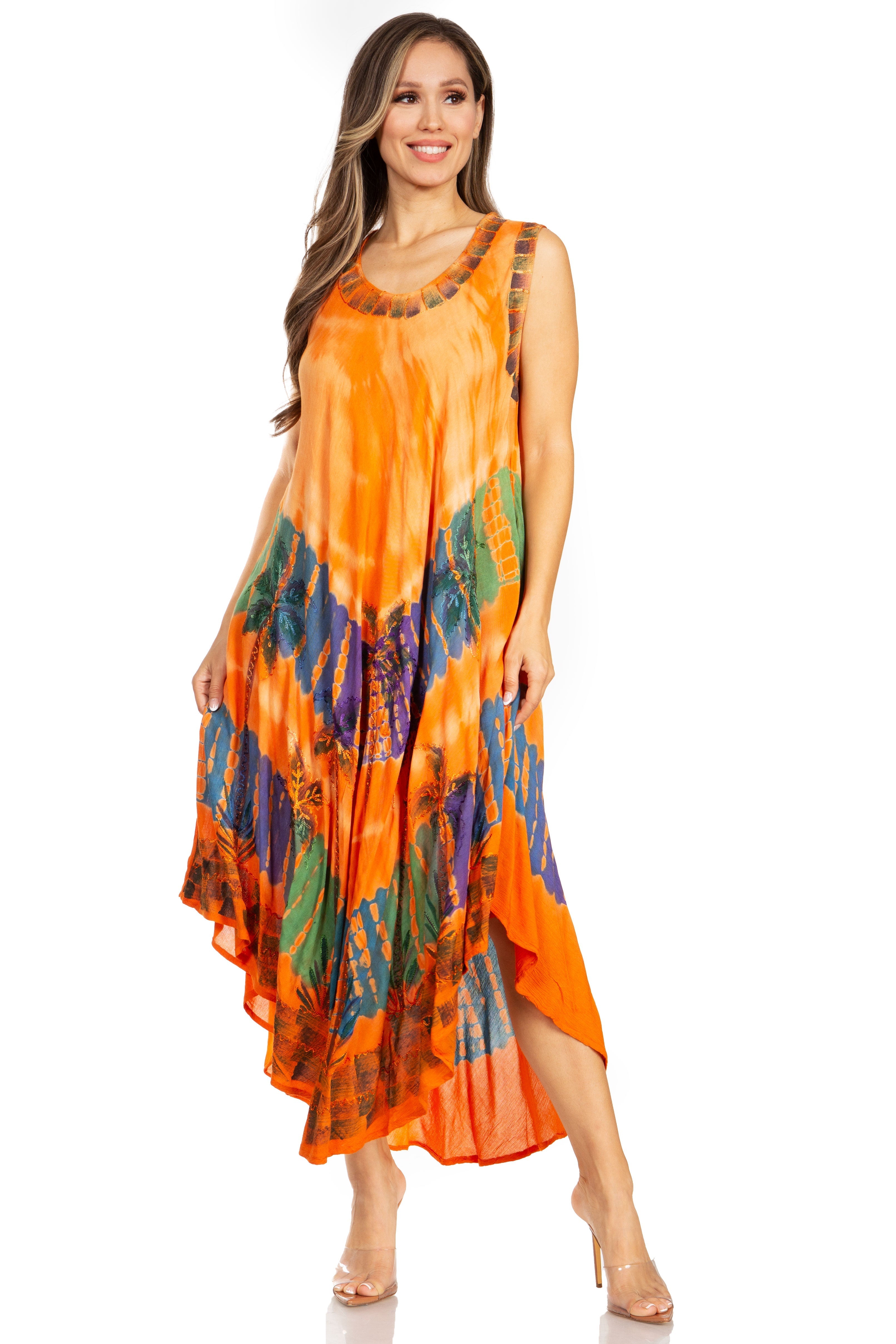 Woman wearing an orange tie-dye dress on a white background