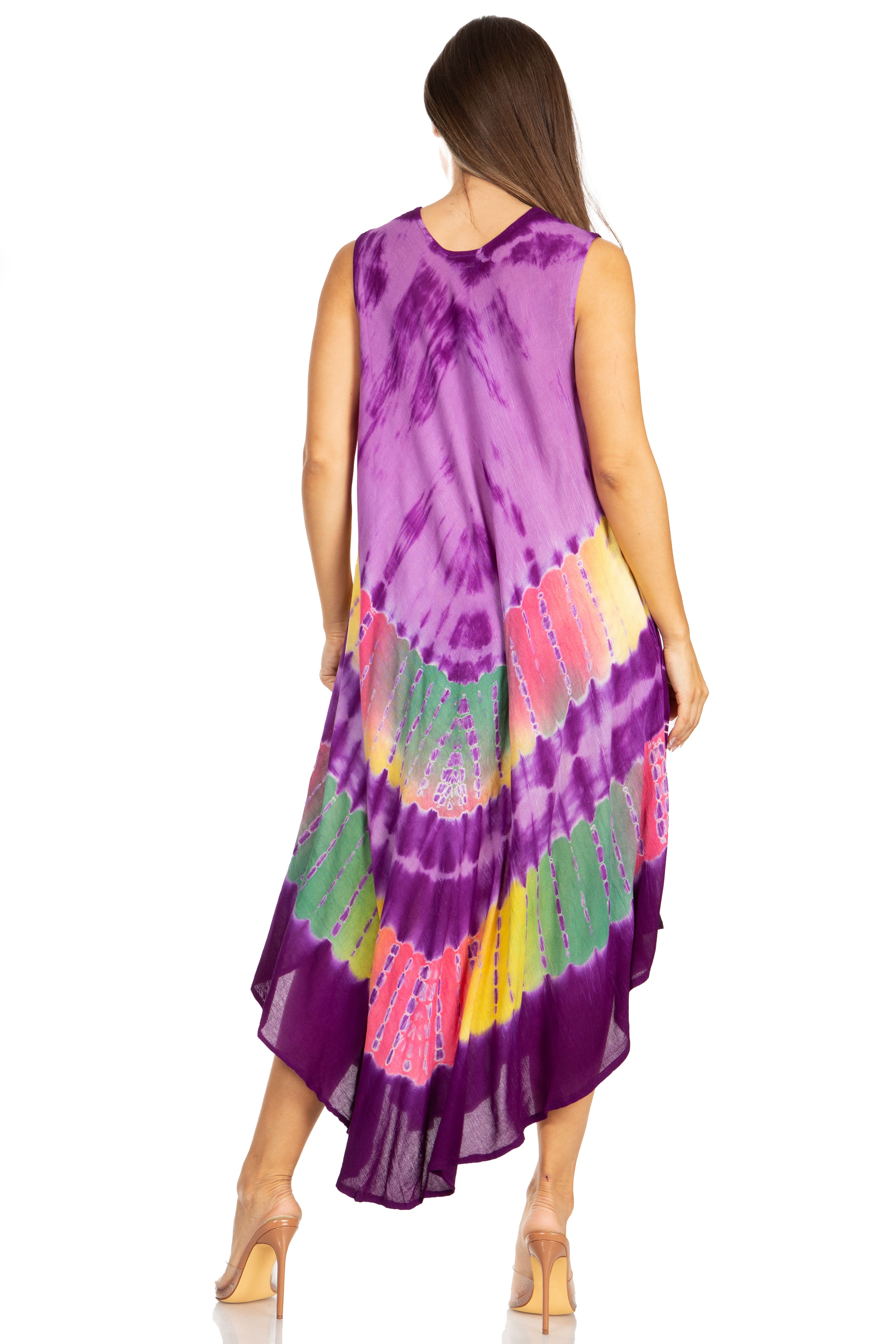 Woman wearing a purple tie-dye dress with colorful patterns on a white background