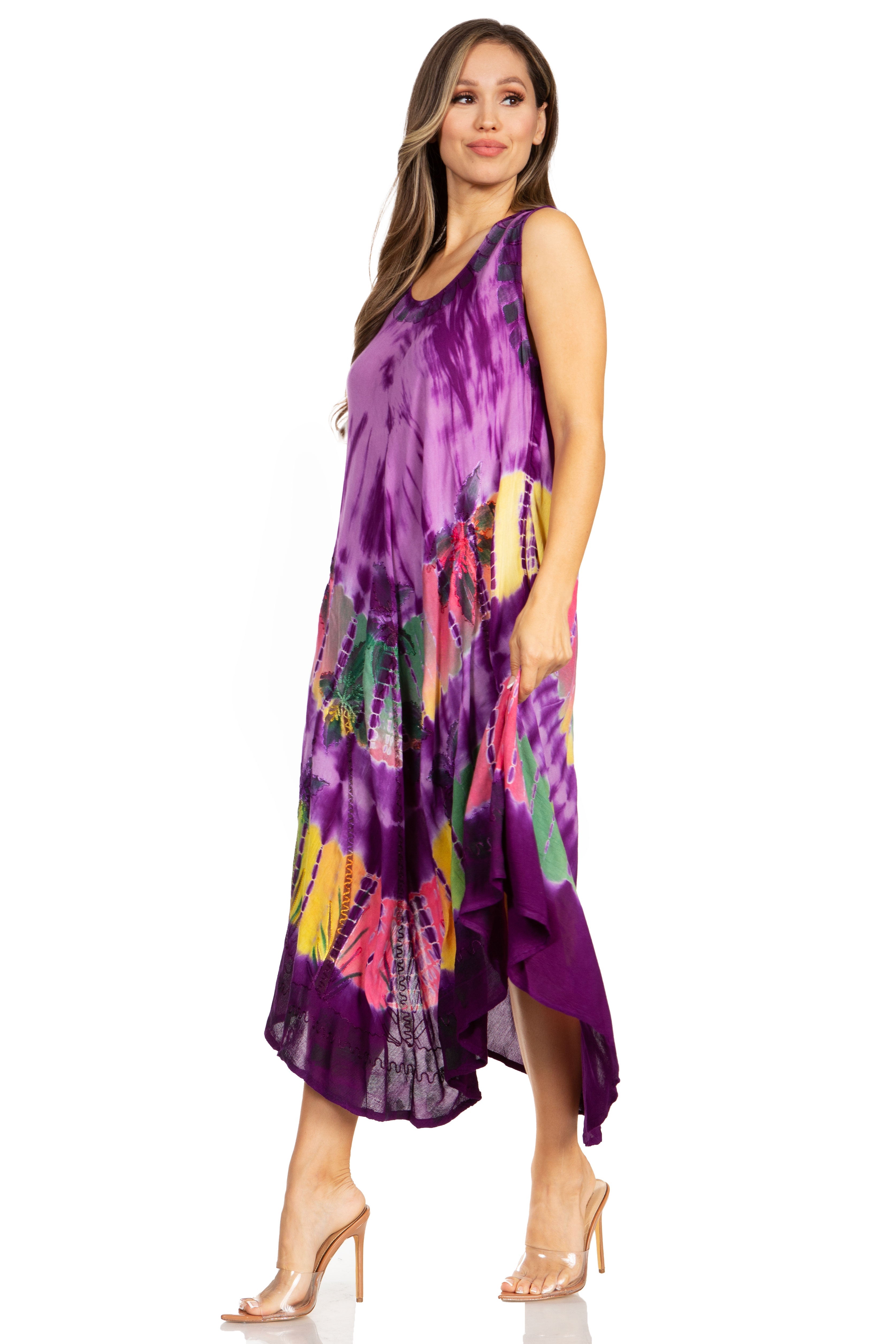 Woman wearing a purple tie-dye dress on a white background