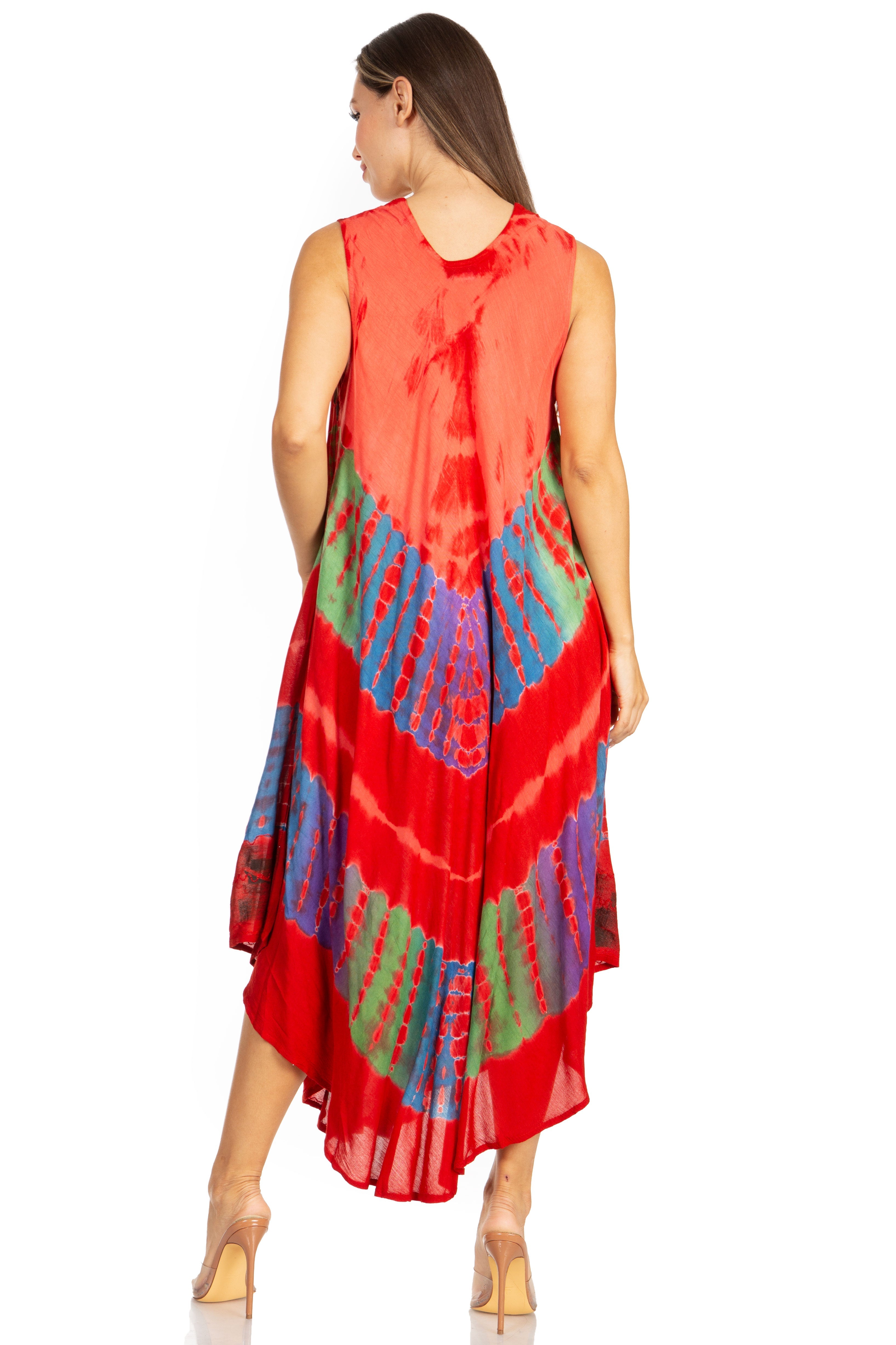 Woman wearing a red dress with colorful patterns on a white background