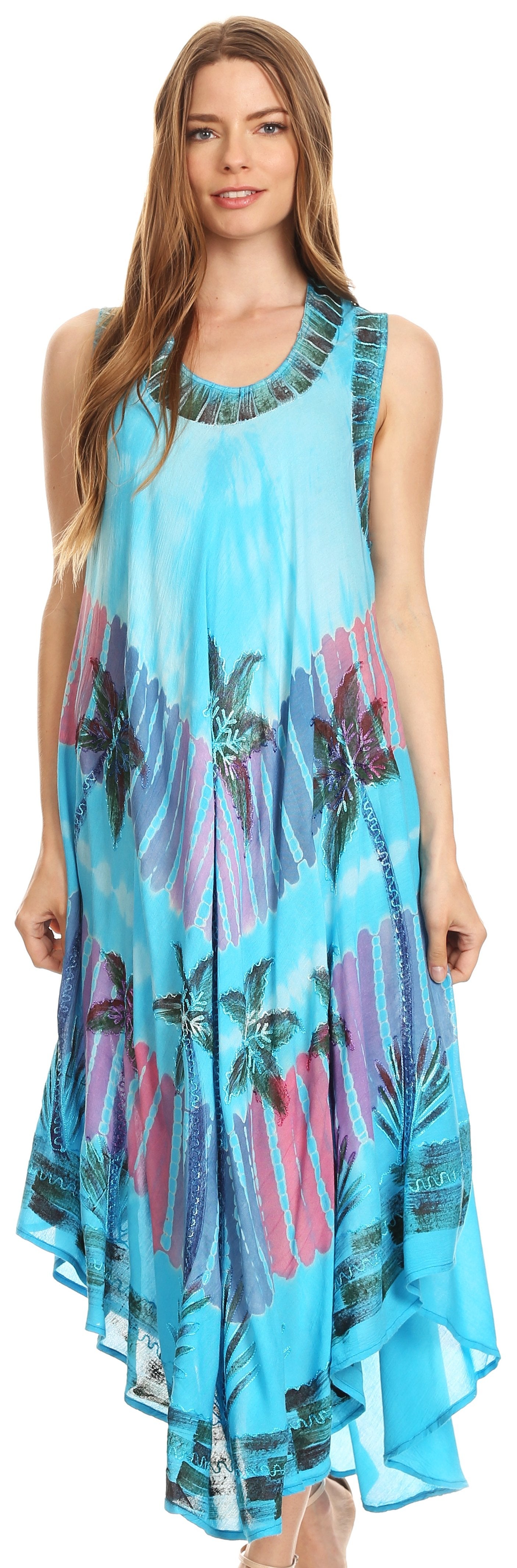 Woman wearing a blue floral dress against a plain background