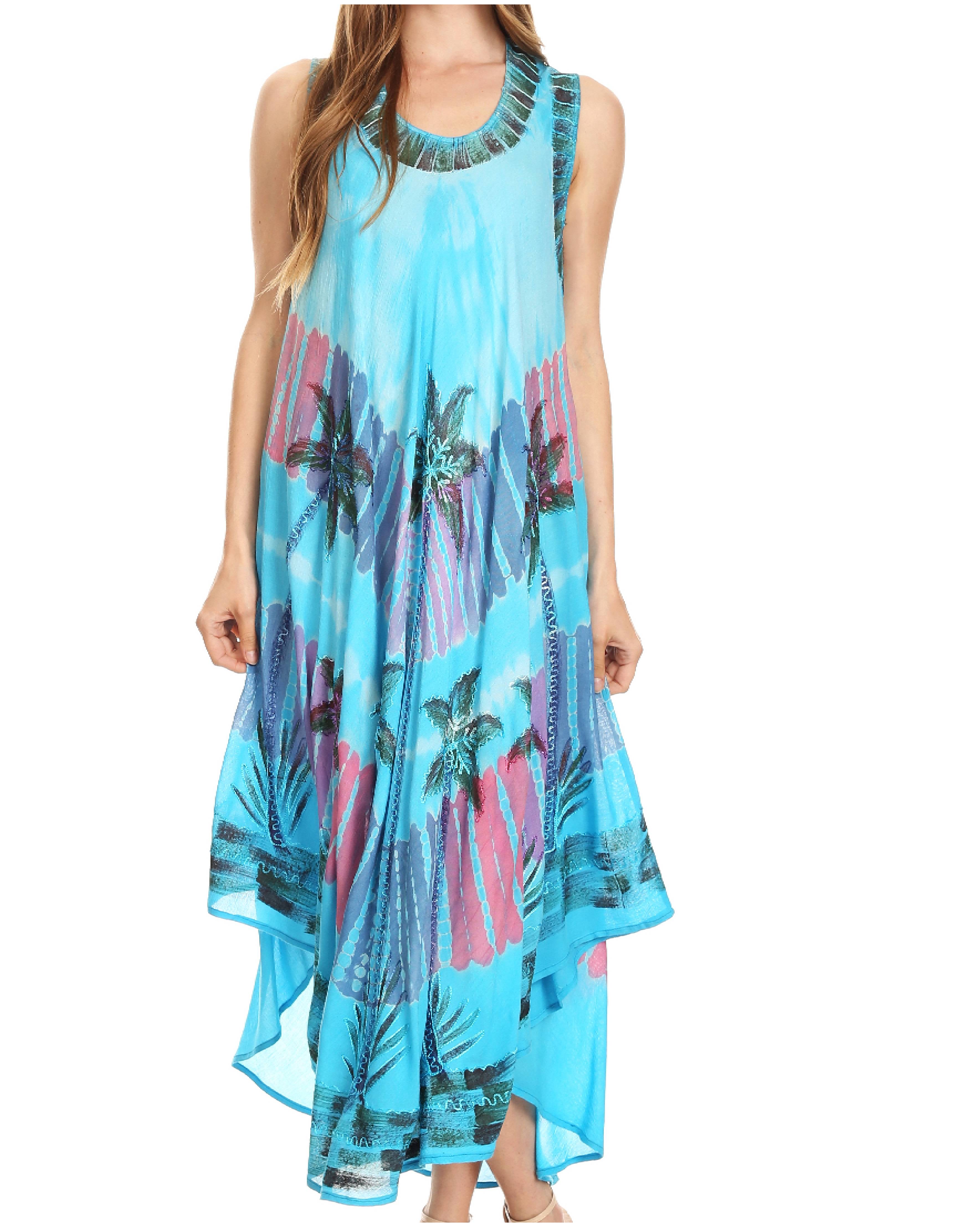 Woman wearing a blue sleeveless dress with palm tree pattern on a white background