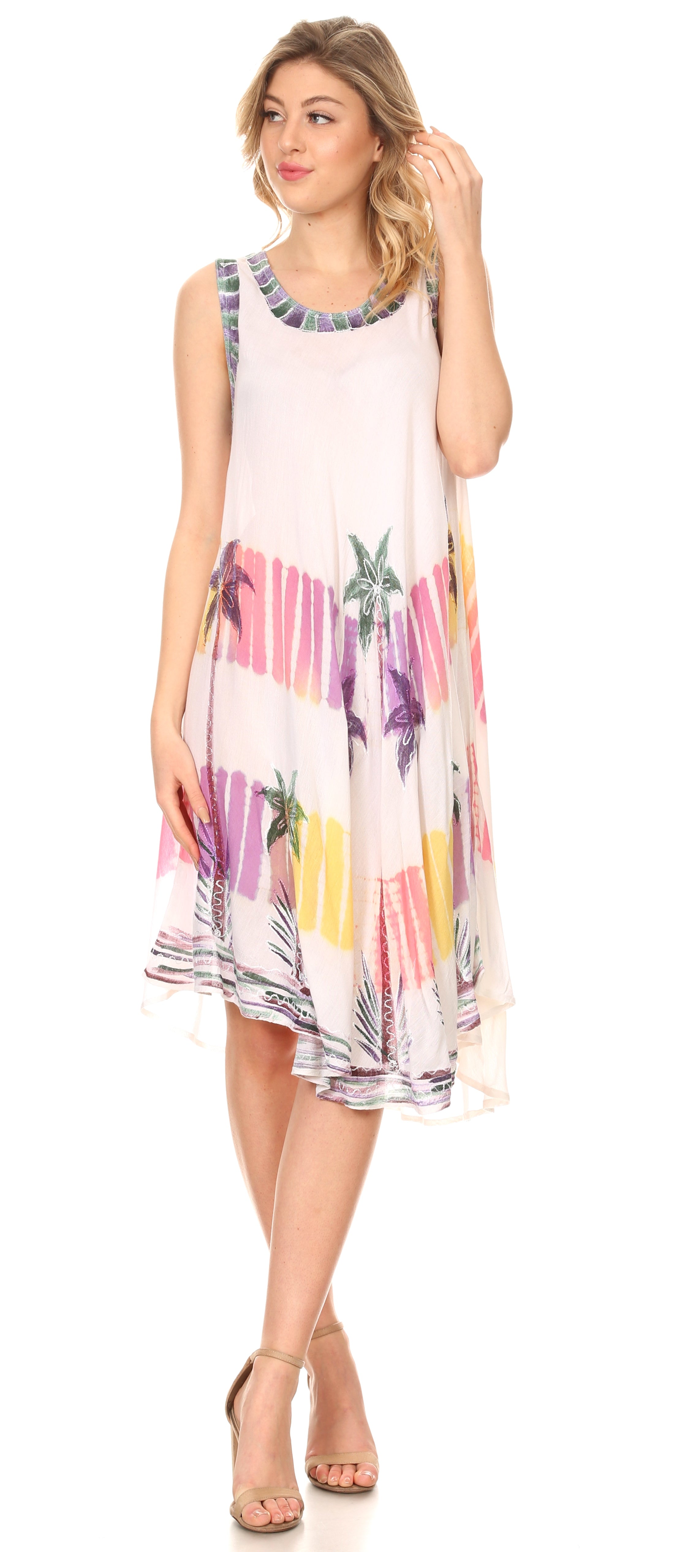 Woman wearing a colorful dress with a white background