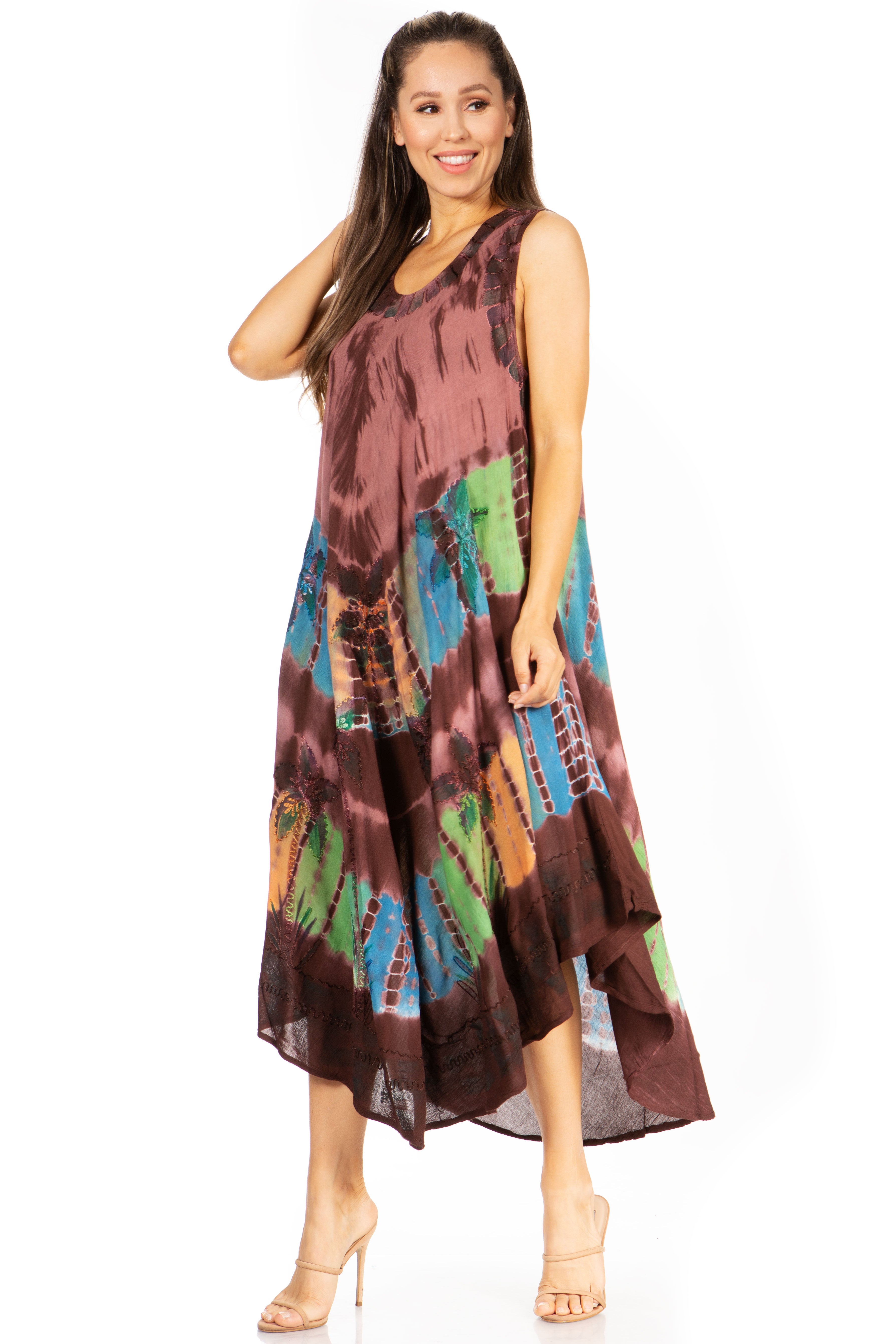Woman wearing a colorful dress on a white background