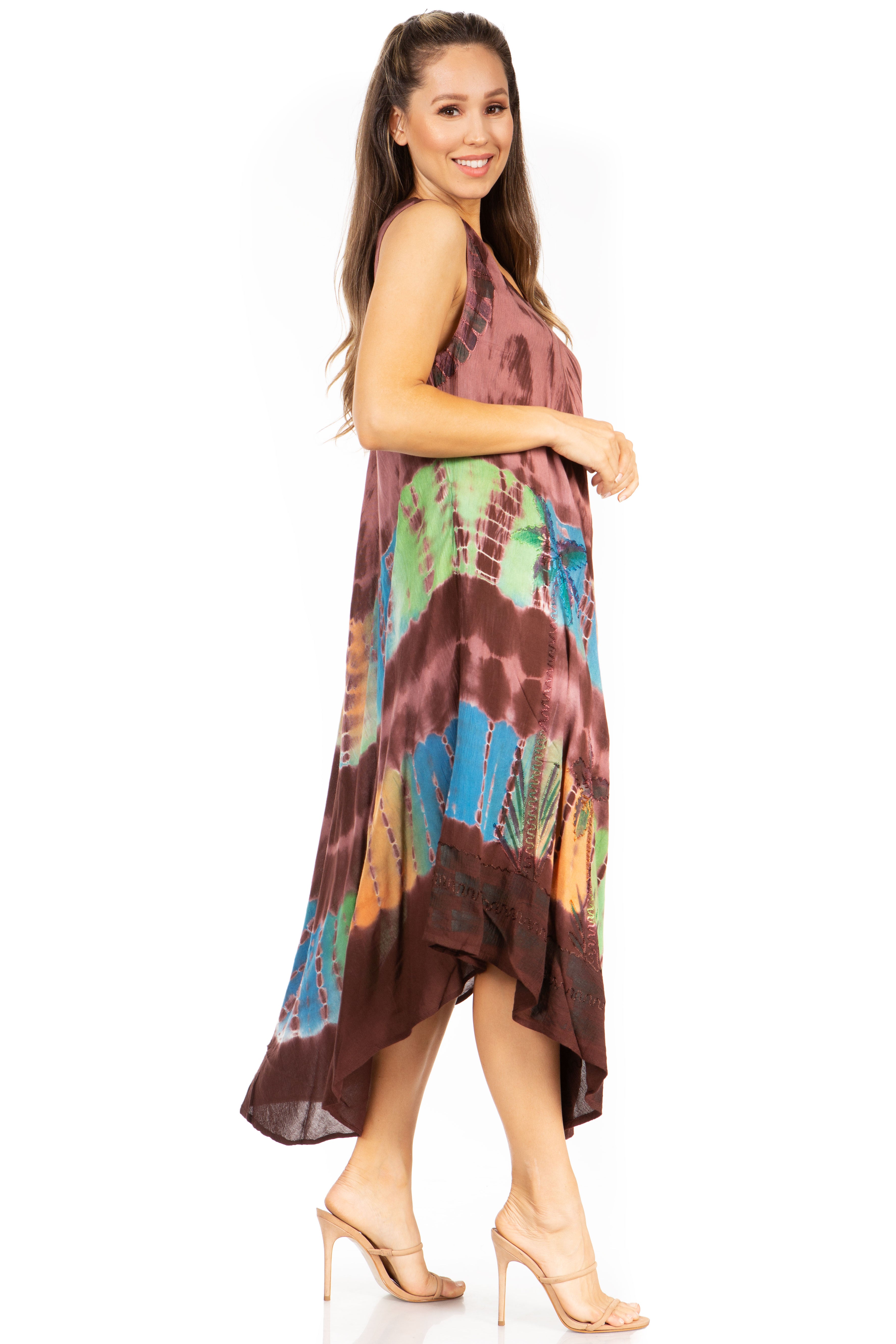 Woman wearing a colorful tie-dye dress on a white background