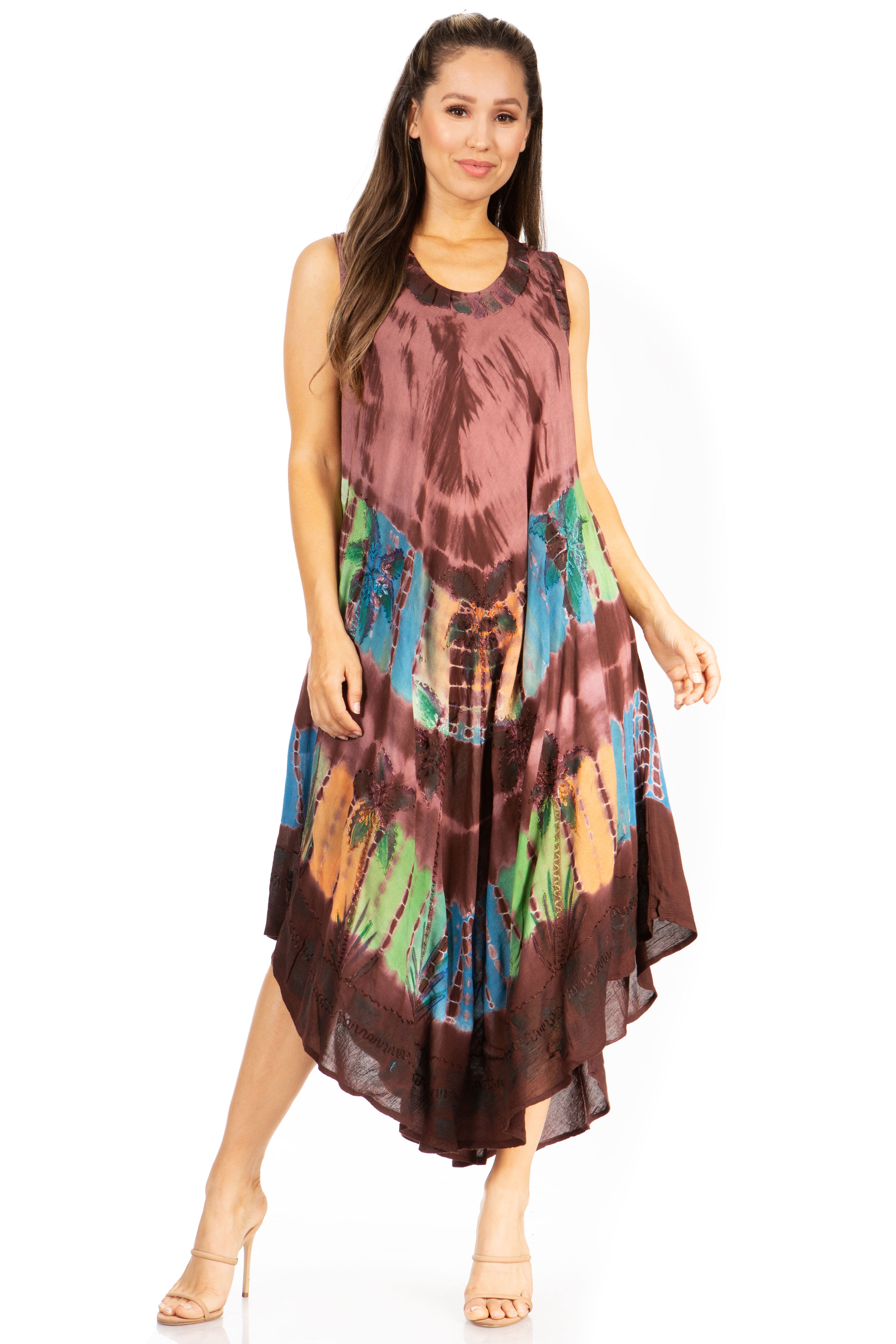 Woman wearing a tie-dye dress with a white background
