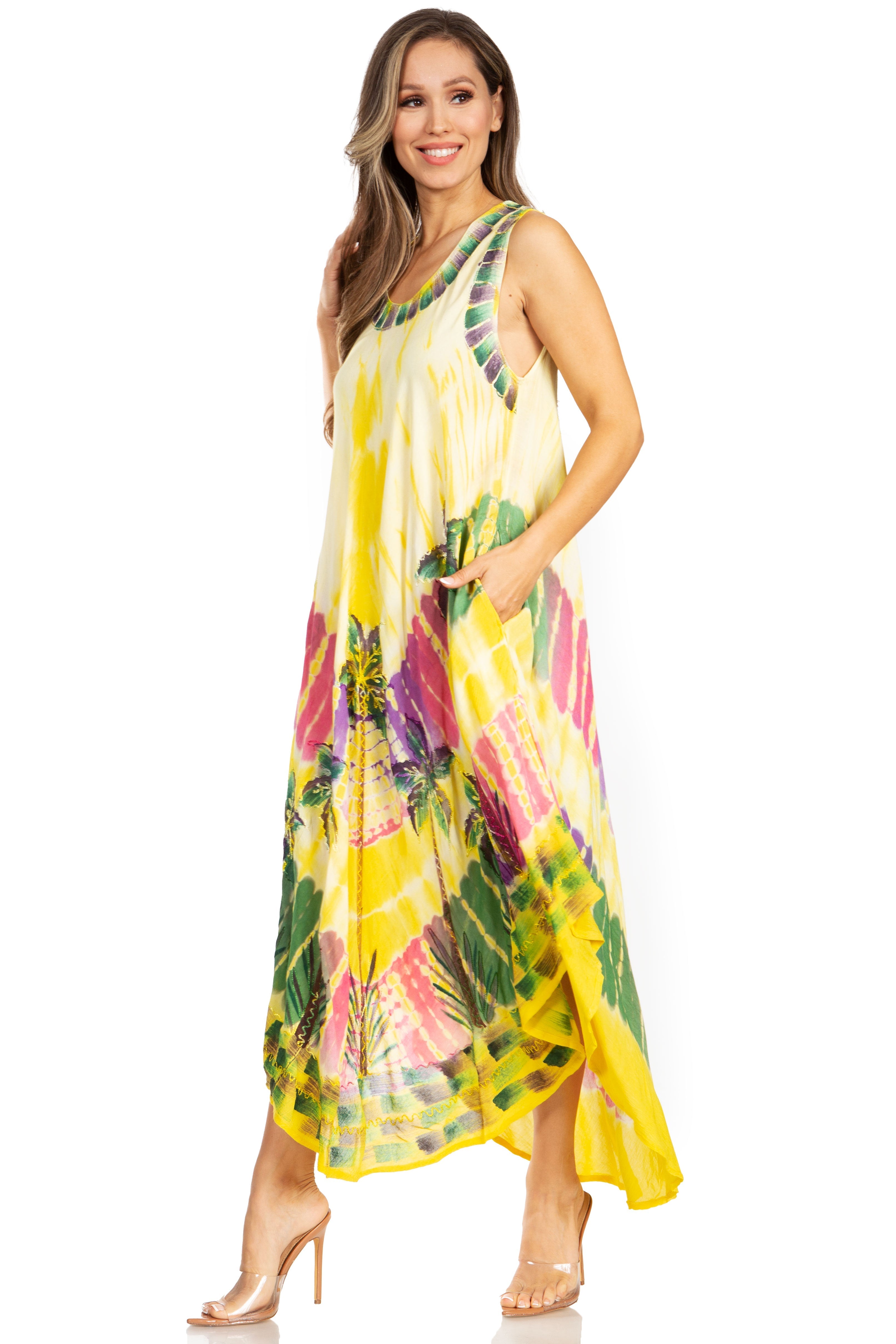 Woman wearing a yellow floral dress on a white background