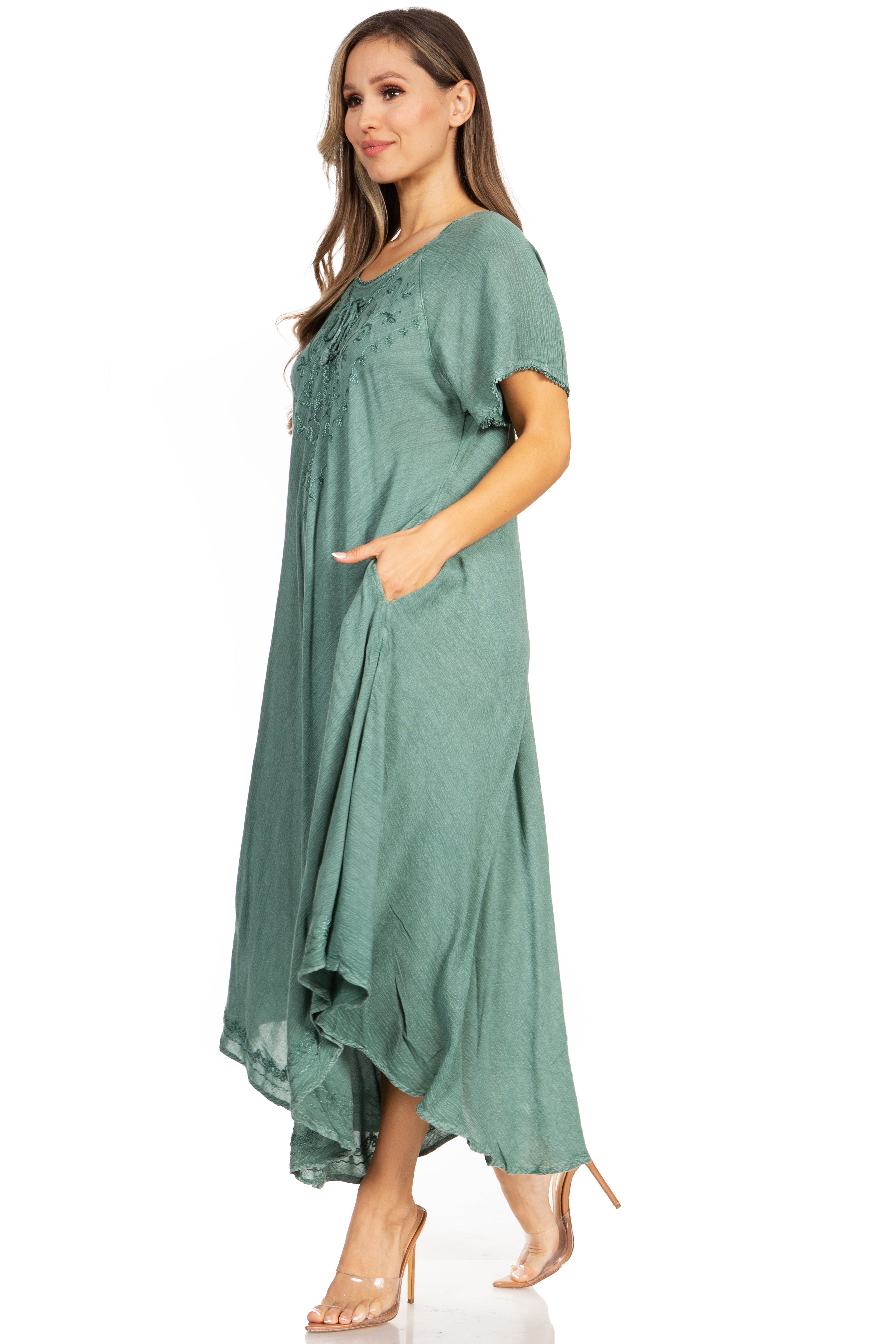 Woman wearing a green dress on a white background