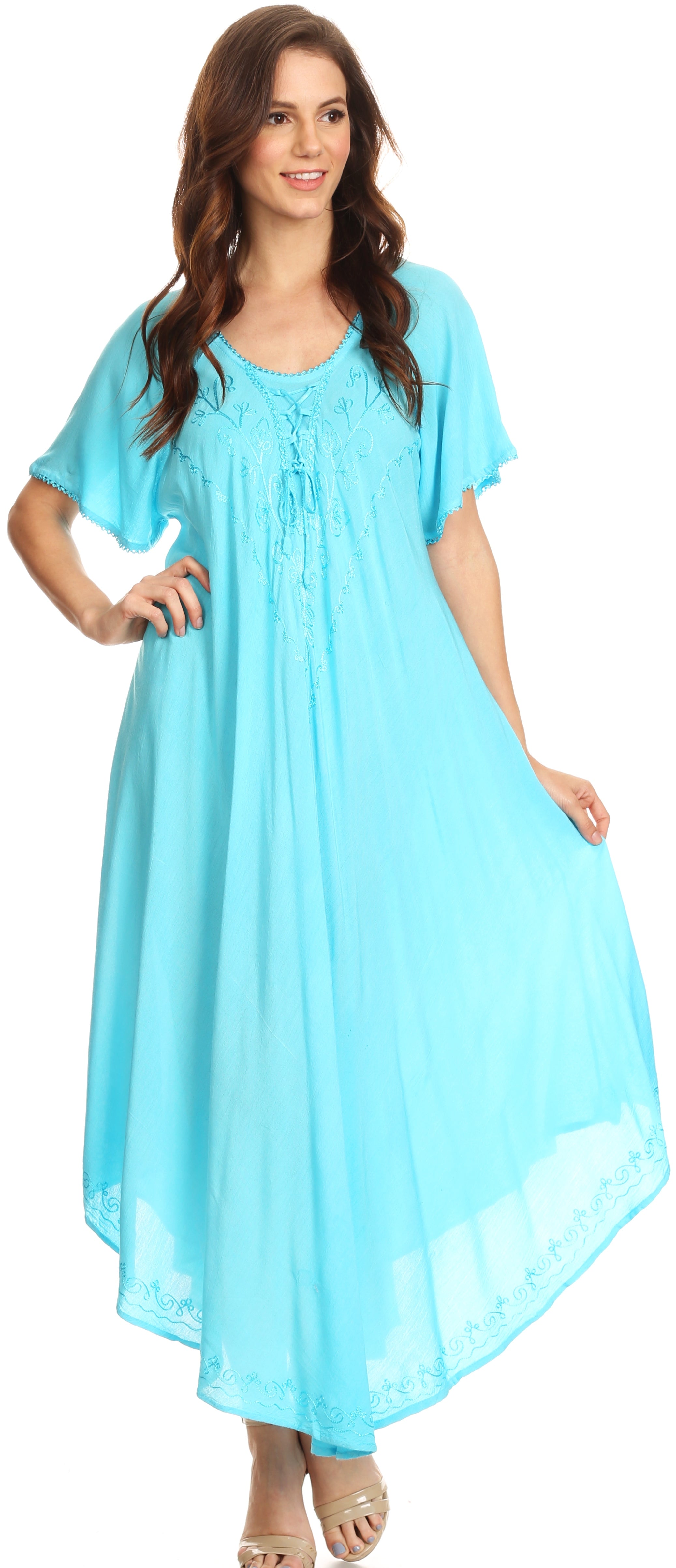Woman wearing a light blue dress on a white background