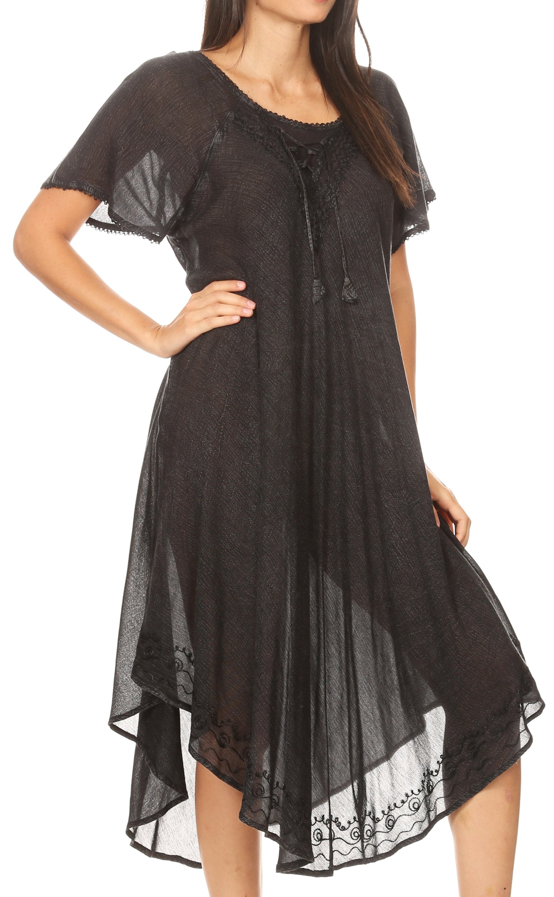 Black lace dress worn by a model on a white background