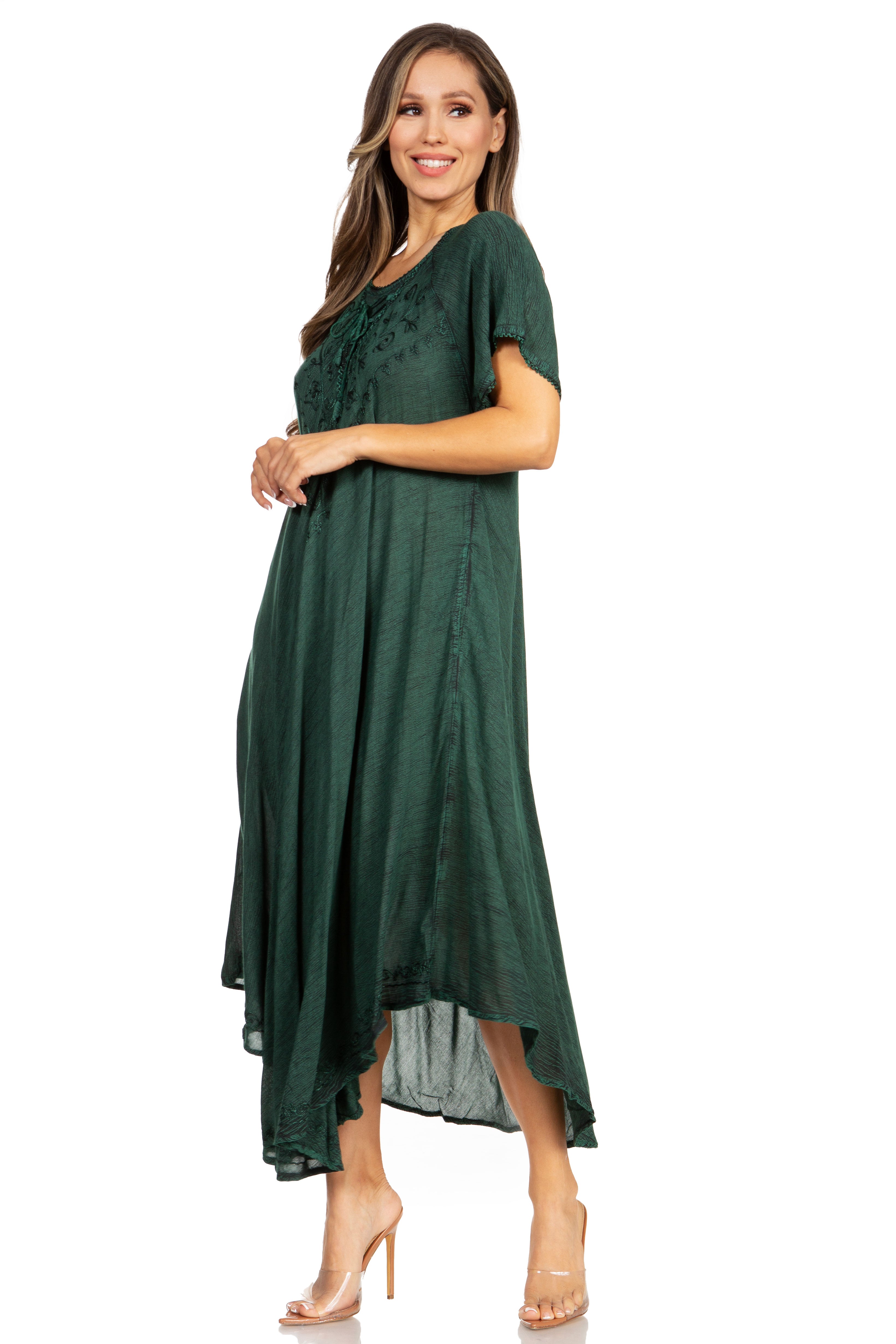 Woman wearing a green dress on a white background