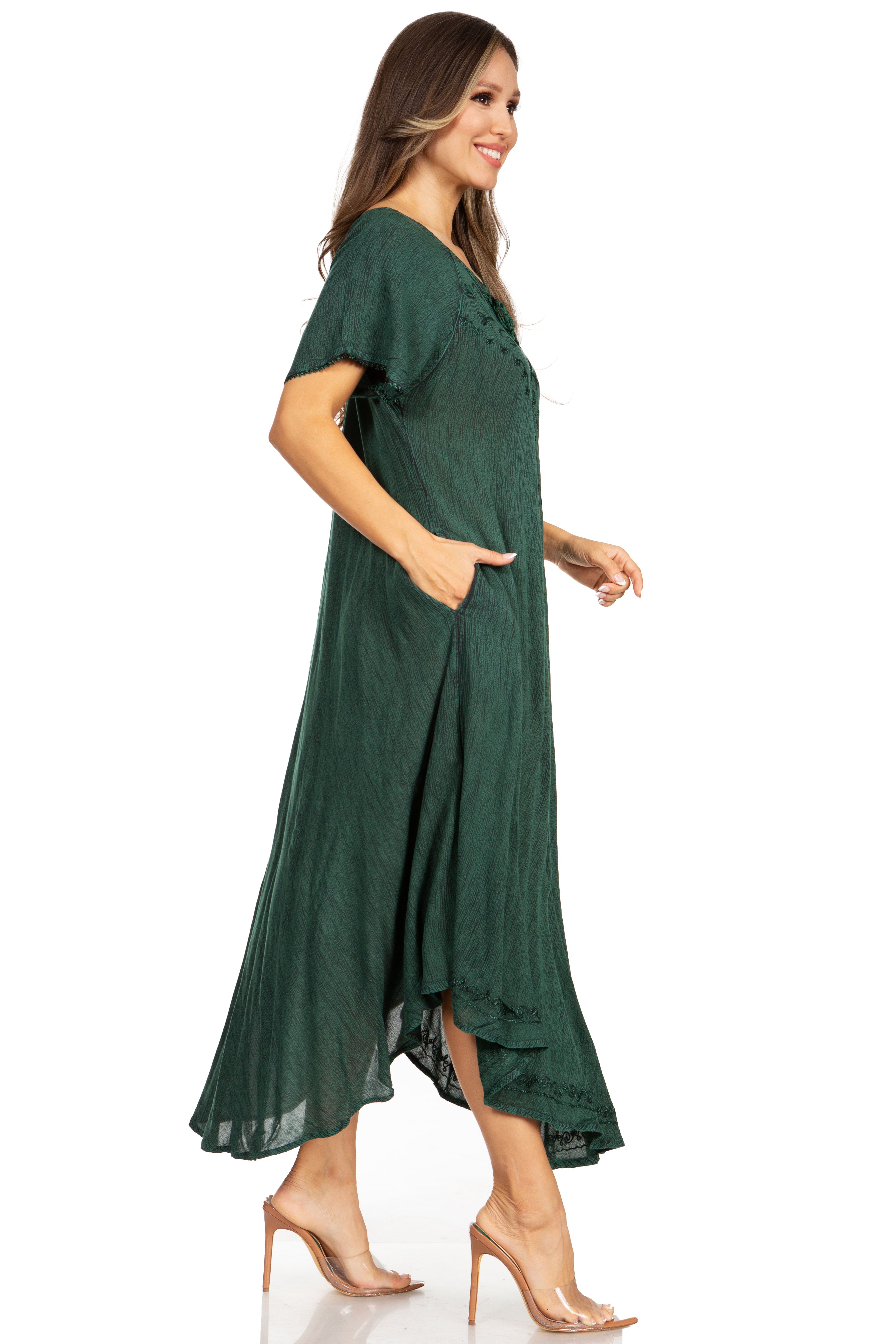 Woman wearing a green dress on a white background
