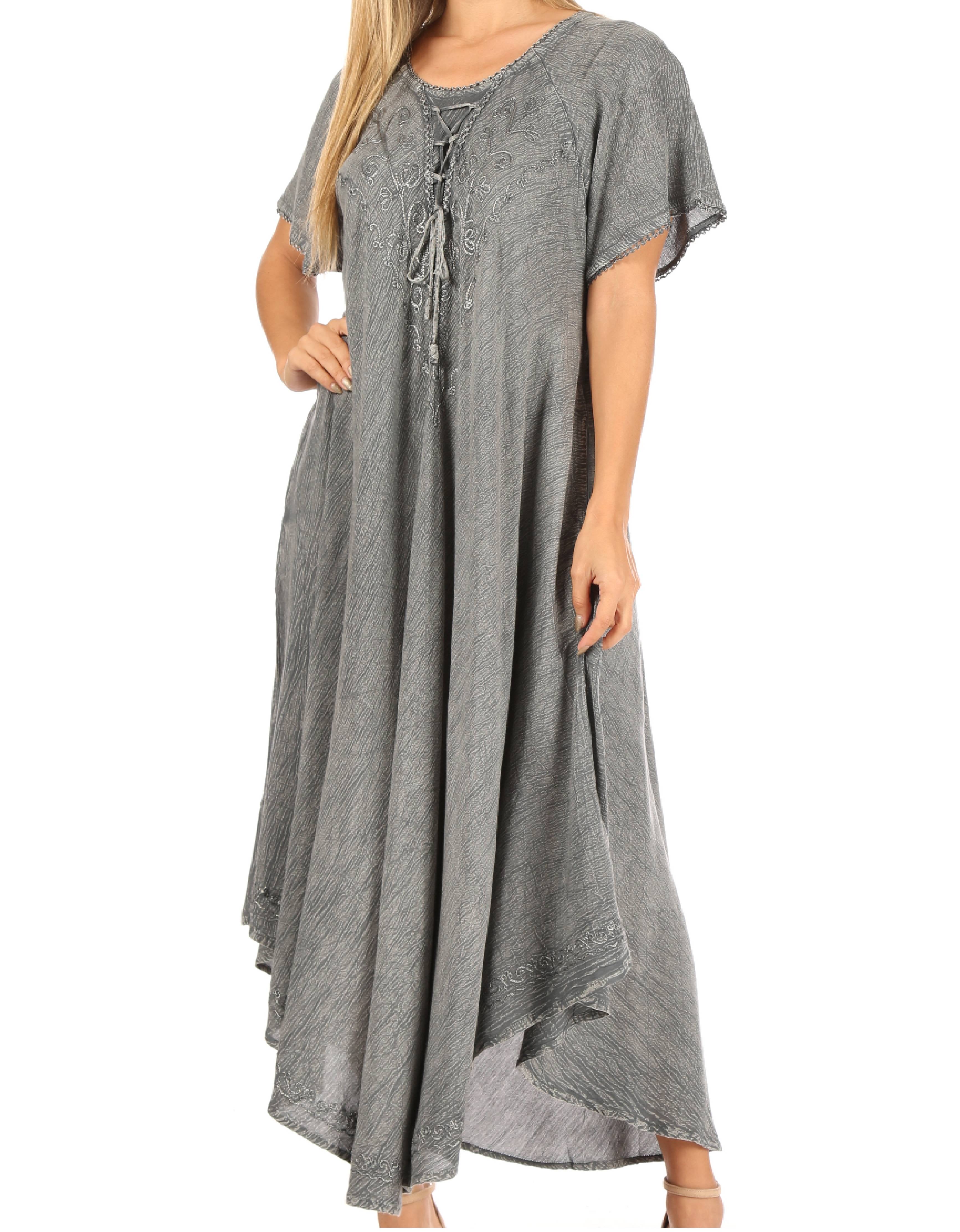 Gray dress with lace-up front worn by a model on a white background