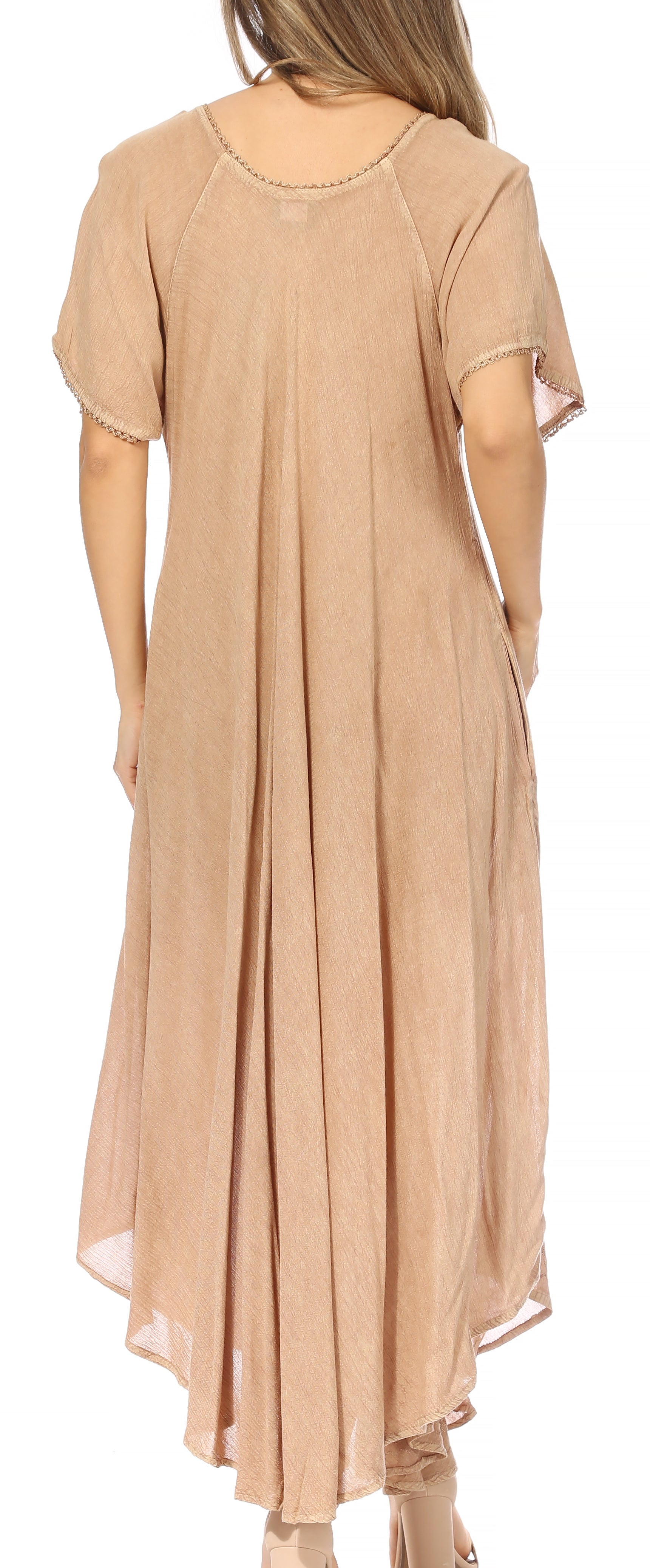 Beige dress worn by a person on a white background