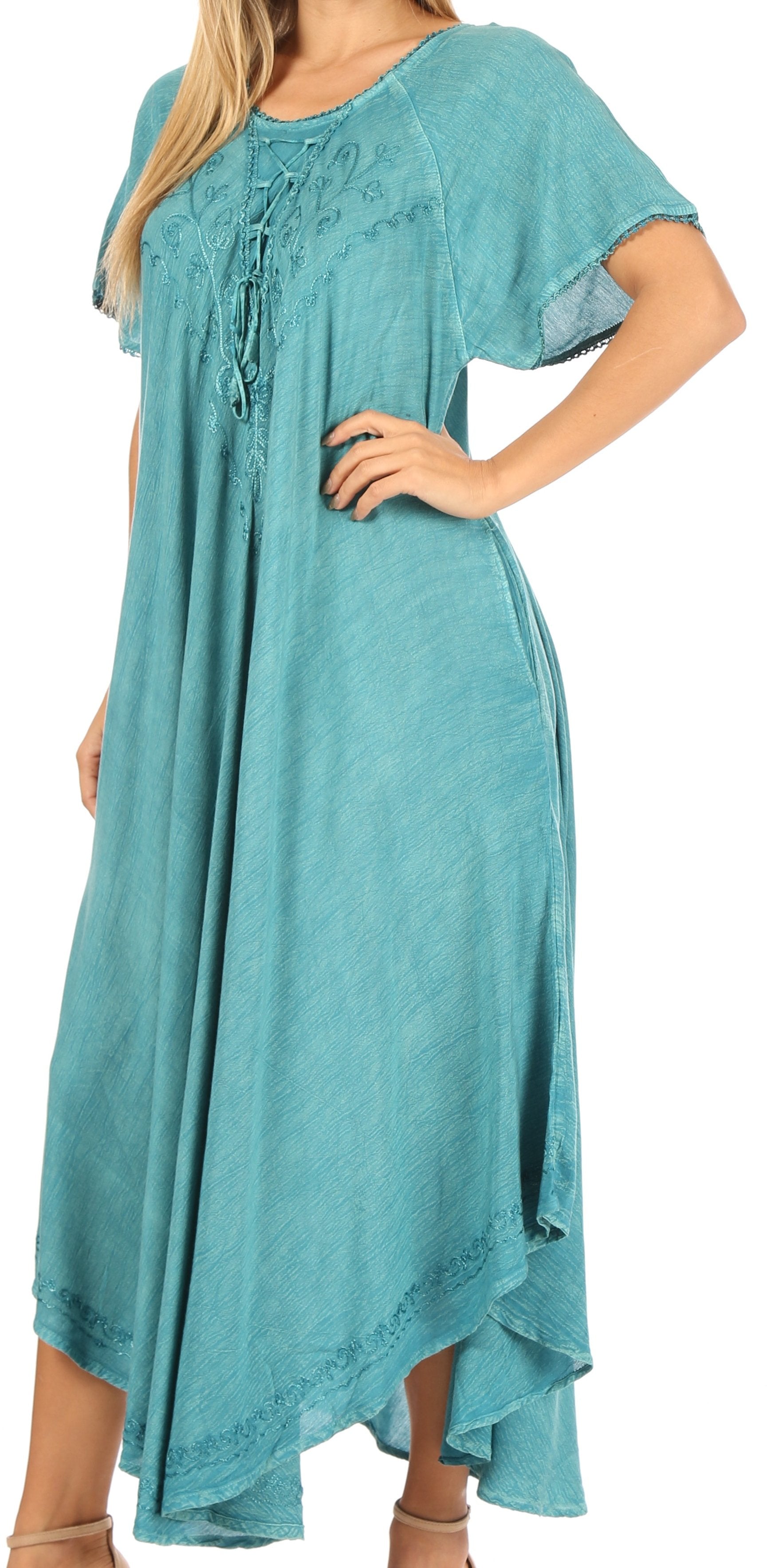 Teal dress worn by a model on a white background