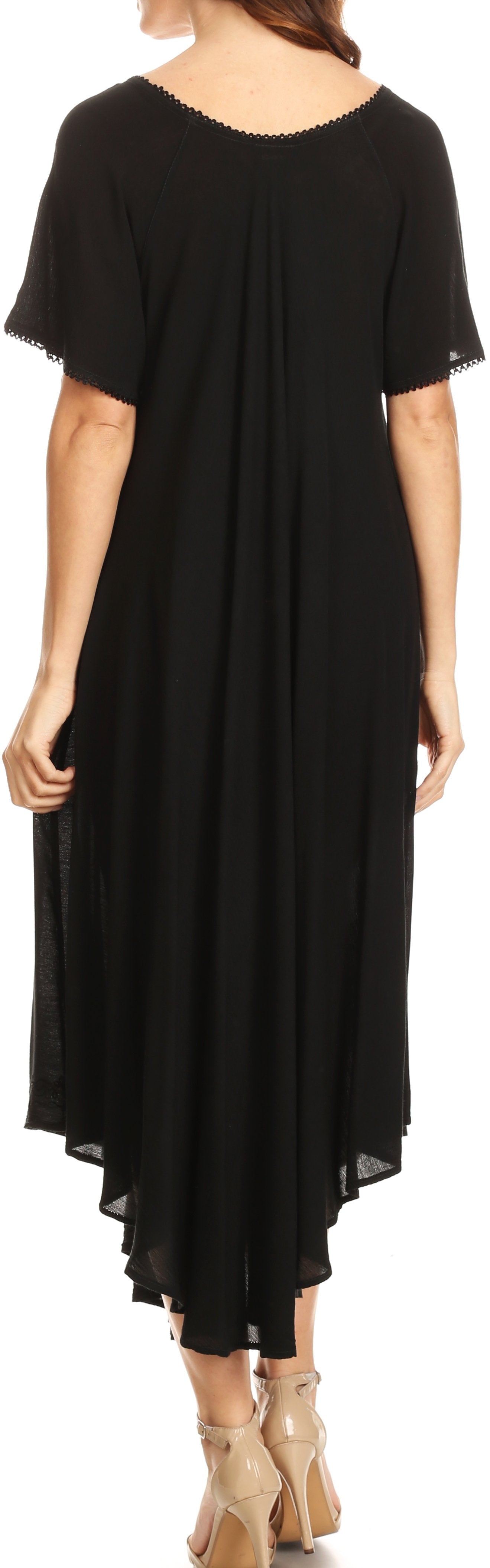 Black dress with short sleeves and a flowing skirt on a plain background