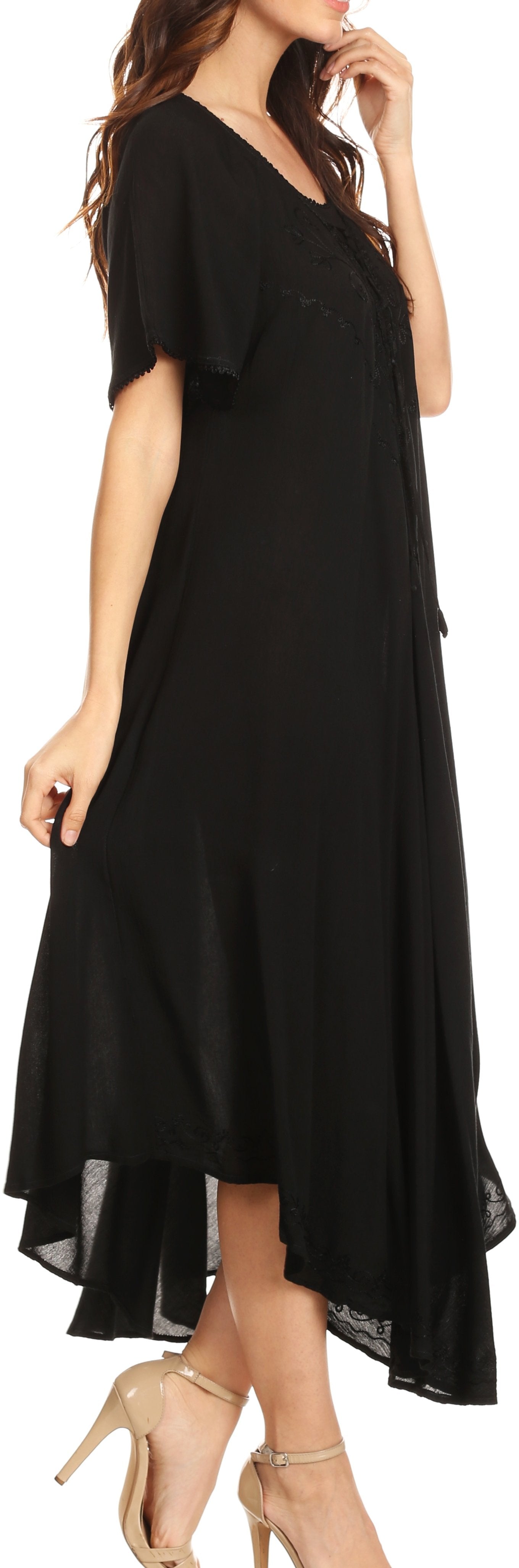 Black dress worn by a model with high-low hemline