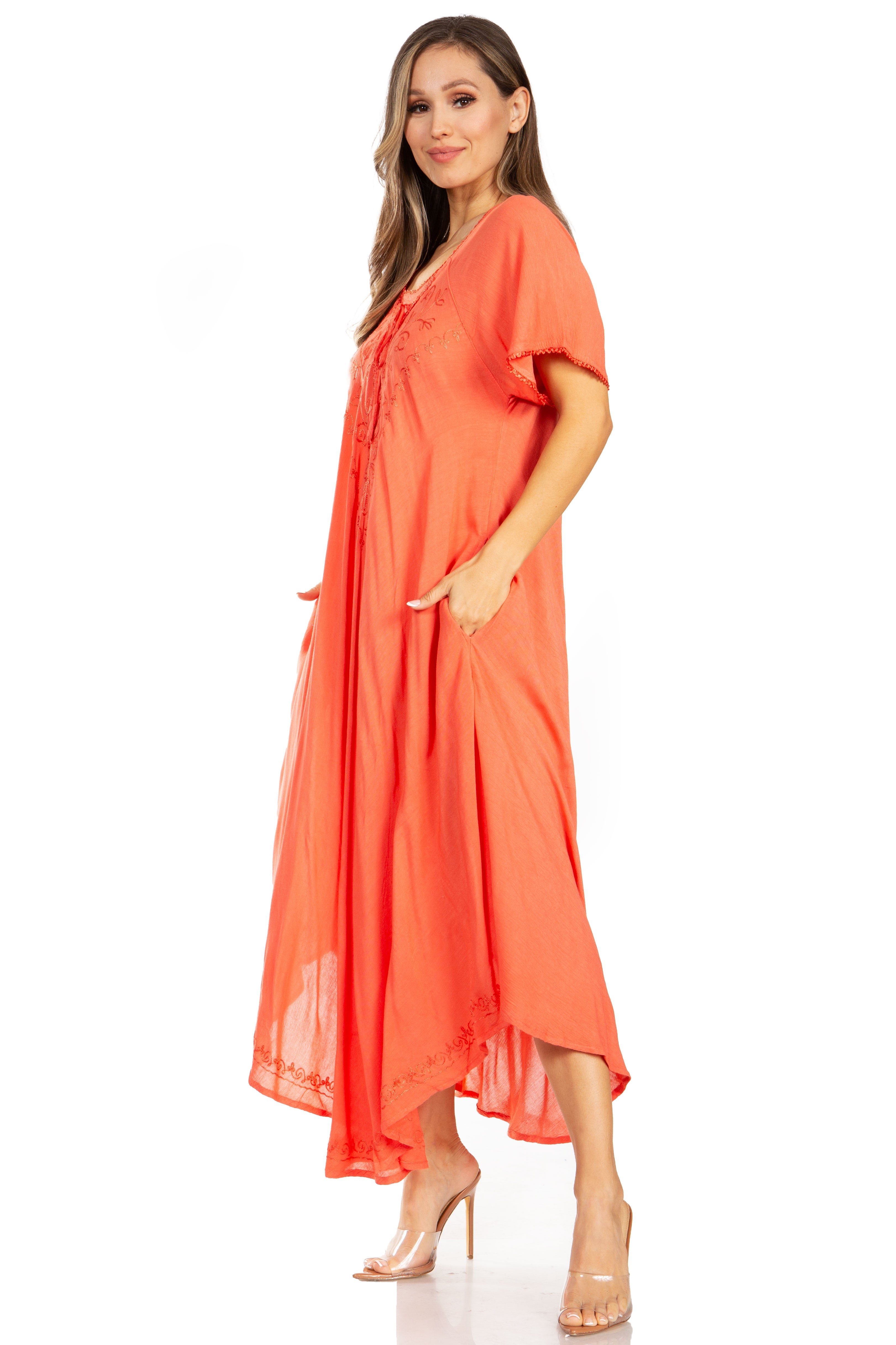 Woman wearing a coral dress on a white background