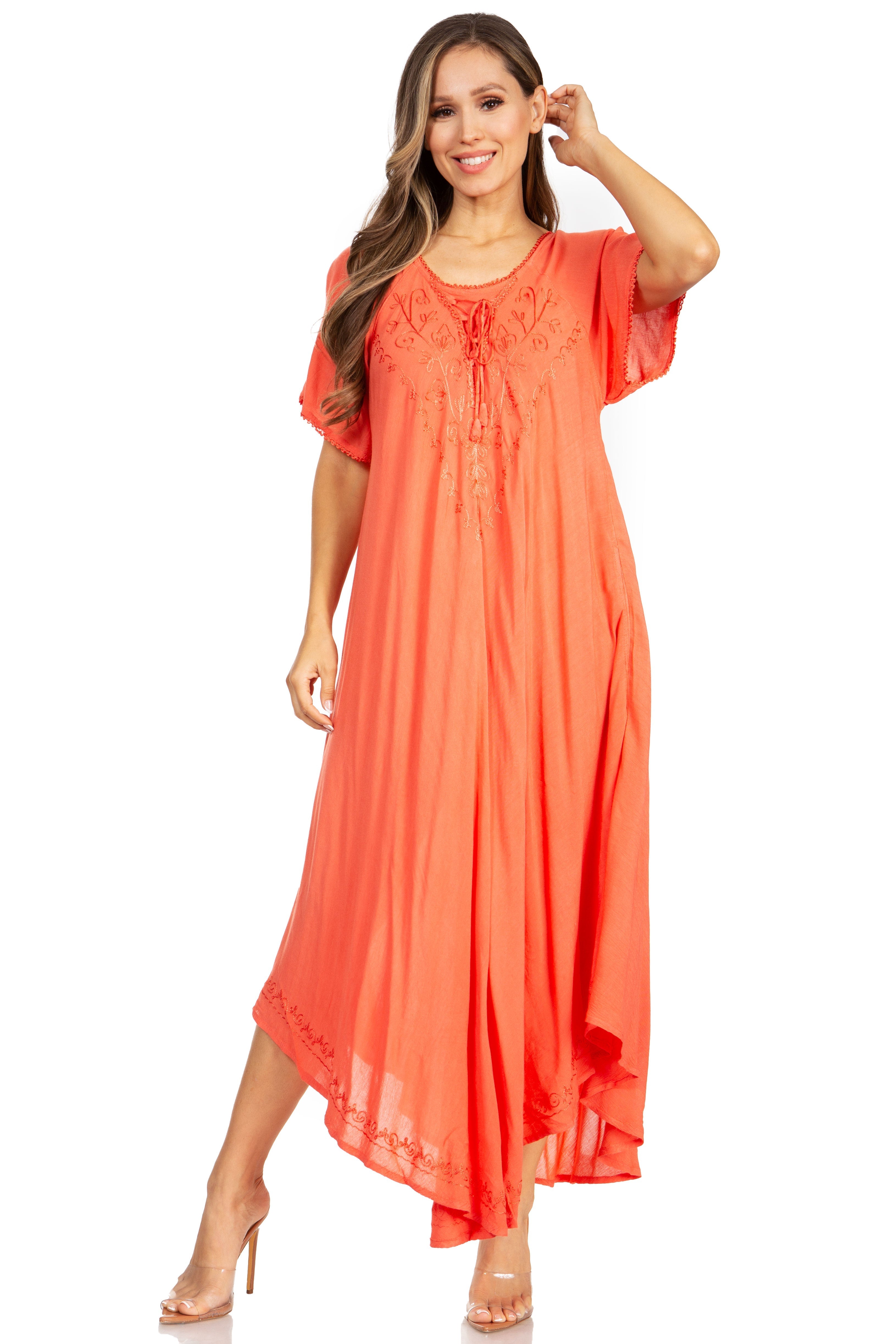 Woman wearing a coral dress on a white background