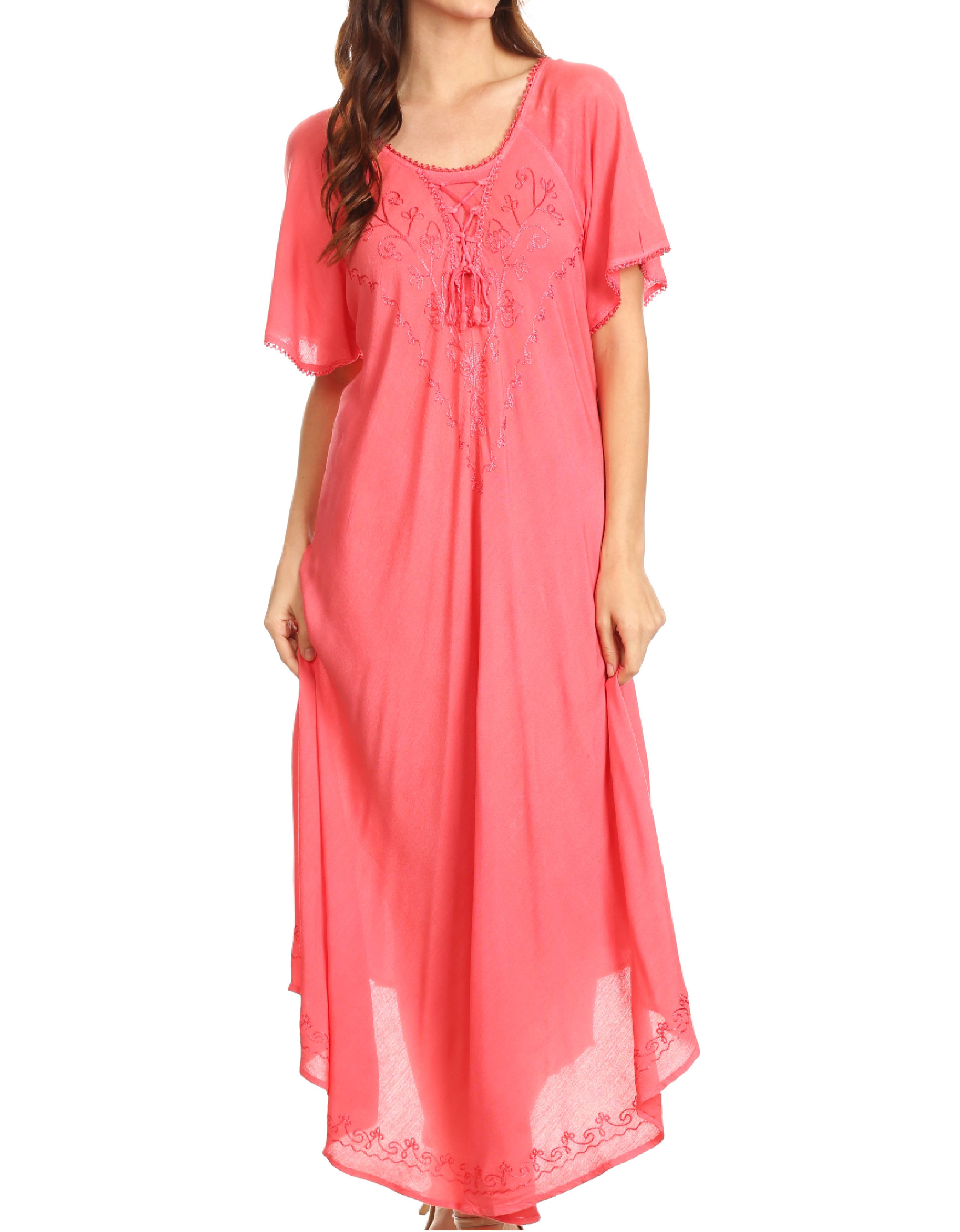 Coral pink dress with lace details on a white background
